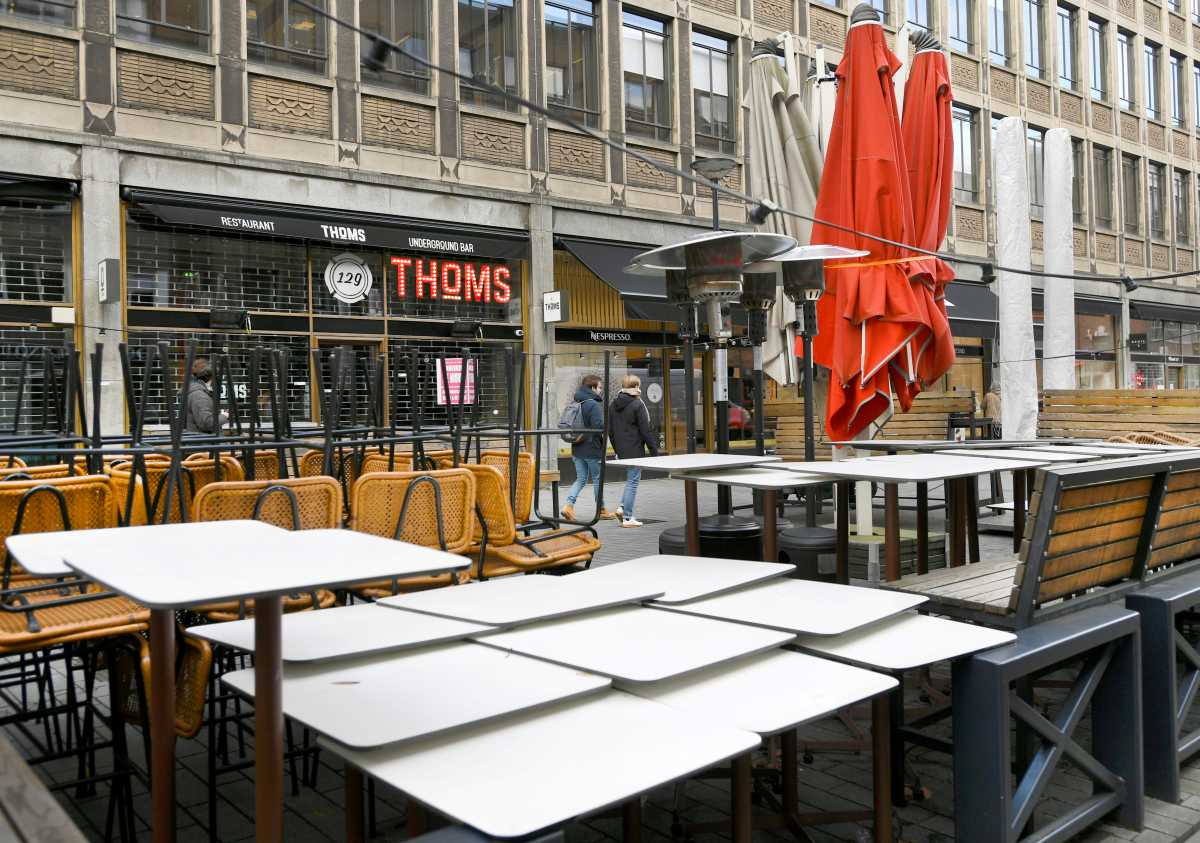 FILE PHOTO: Tables and chairs are stacked on an empty shopping street as Netherlands is set to extend the lockdown as the spread of the coronavirus disease (COVID-19) continues in Rotterdam, Netherlands January 12, 2021. REUTERS
