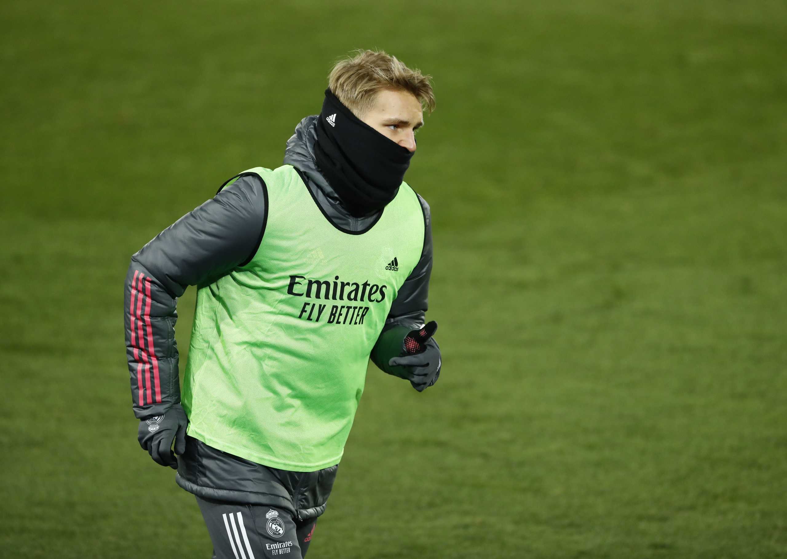 Soccer Football - La Liga Santander - Real Madrid v Celta Vigo - Estadio Alfredo Di Stefano, Madrid, Spain - January 2, 2021 Real Madrid's Martin Odegaard warming up REUTERS