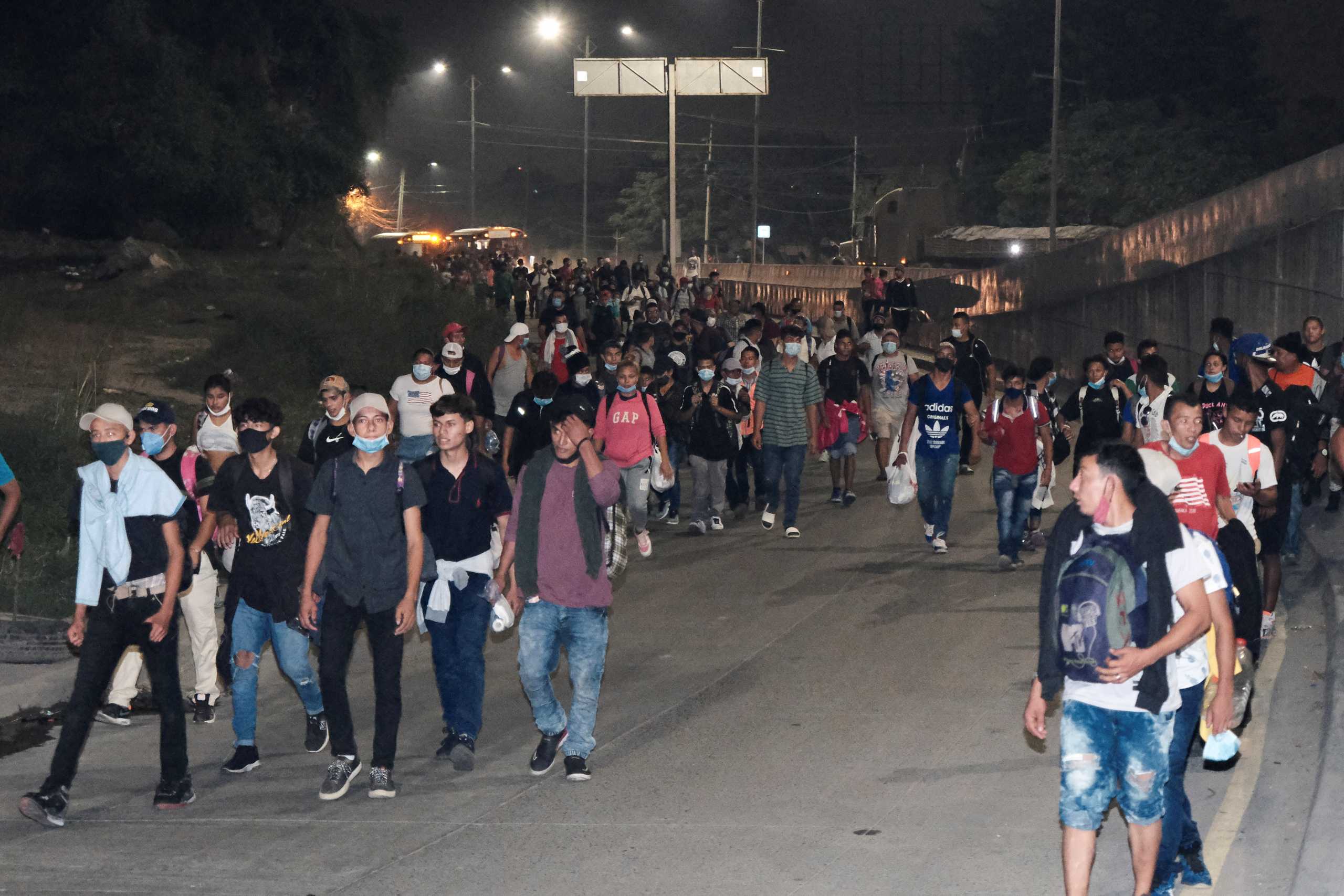Hondurans take part in a new caravan of migrants, set to head to the United States, in San Pedro Sula, Honduras January 15, 2021. REUTERS