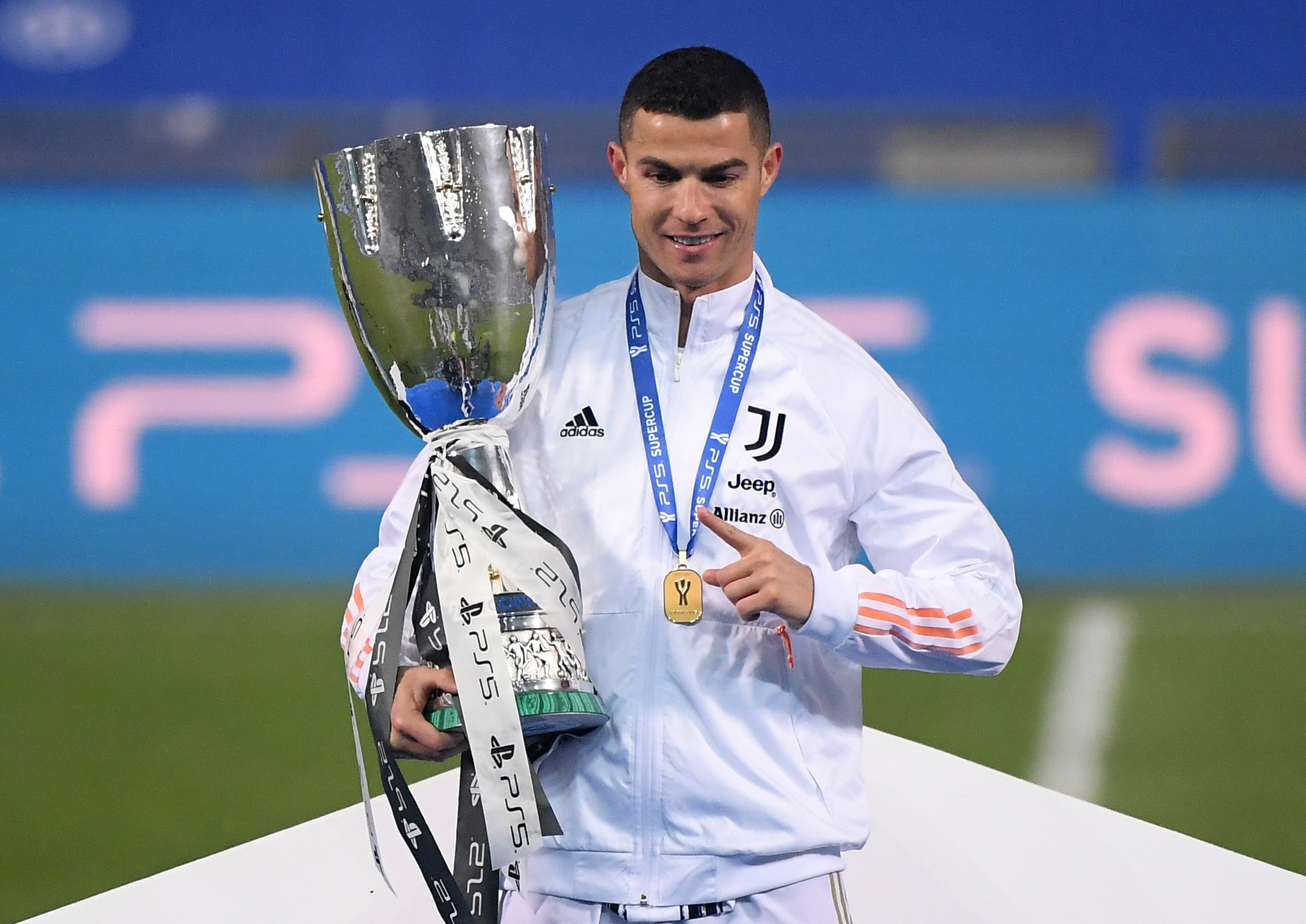 Soccer Football - Italian Super Cup - Final - Juventus v Napoli - Mapei Stadium, Reggio Emilia, Italy - January 20, 2021 Juventus' Cristiano Ronaldo celebrates with the Italian Super Cup REUTERS