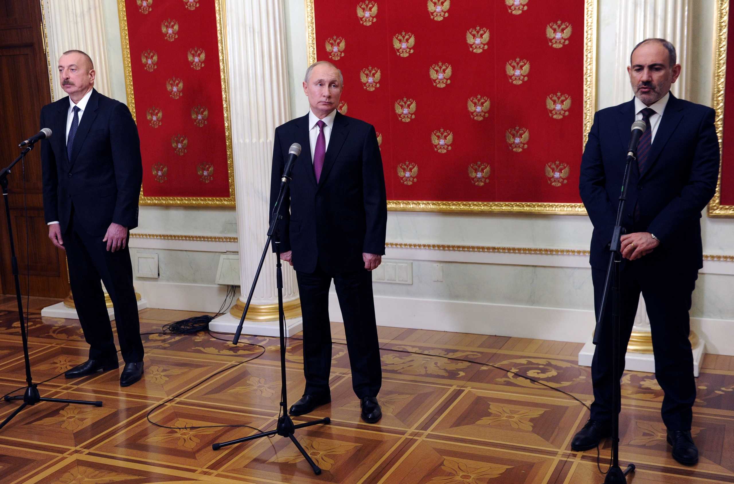 Russia's President Vladimir Putin, Azerbaijan's President Ilham Aliyev and Armenia's Prime Minister Nikol Pashinyan attend a news conference following their meeting to discuss the implementation of the ceasefire over Nagorno-Karabakh reached on November 9 and measures to solve problems in the region, in Moscow, Russia January 11, 2021. Sputnik