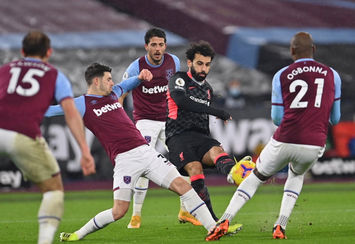 Soccer Football - Premier League - West Ham United v Liverpool - London Stadium, London, Britain - January 31, 2021 Liverpool's Mohamed Salah scores their first goal Pool via REUTERS