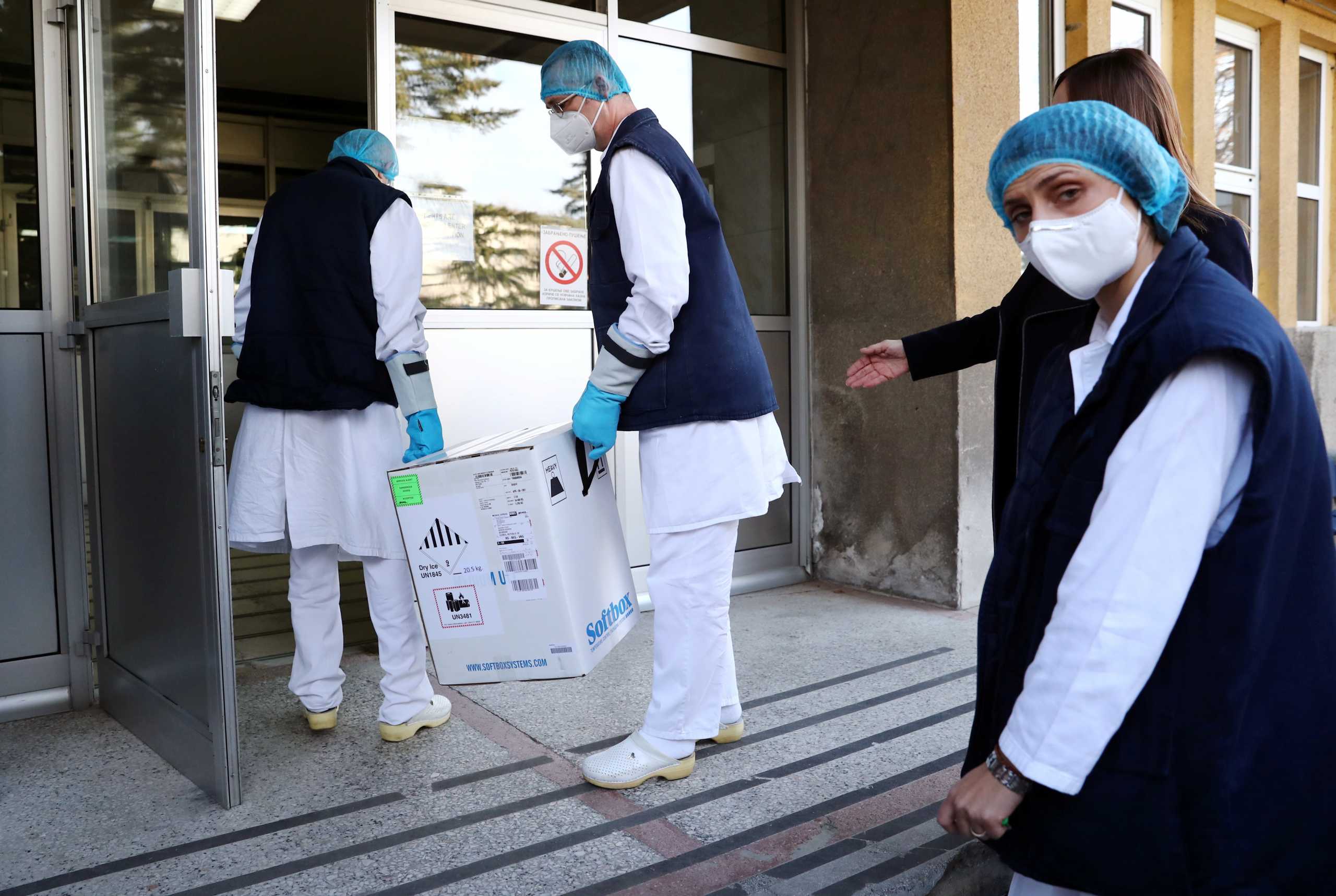 Medical workers receive the first shipment of Pfizer-BioNTech coronavirus disease (COVID-19) vaccines at The Institute of Virology, Vaccines and Sera "Torlak" in Belgrade, Serbia, December 22, 2020. REUTERS