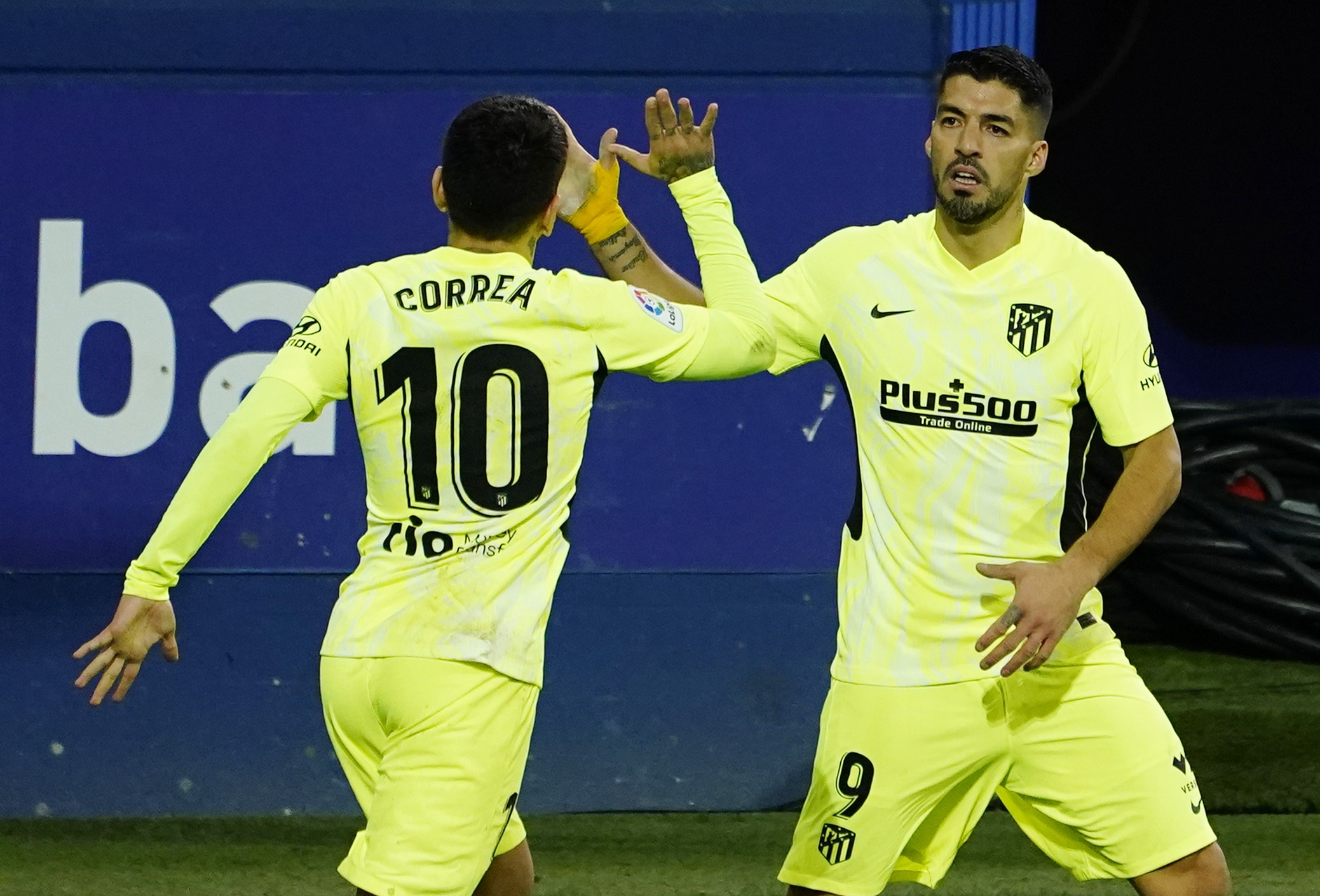 Soccer Football - La Liga Santander - Eibar v Atletico Madrid - Ipurua Municipal Stadium, Eibar, Spain - January 21, 2021 Atletico Madrid's Luis Suarez celebrates scoring their first goal with Angel Correa REUTERS