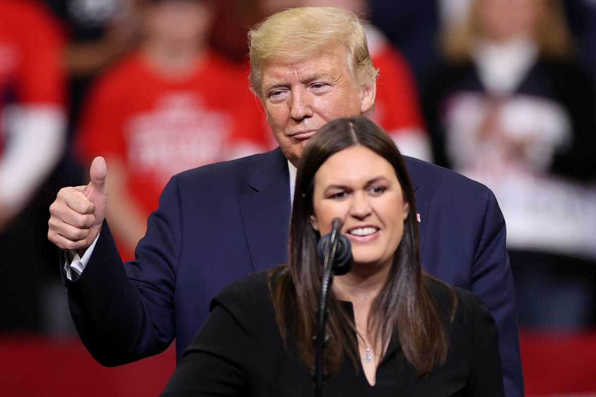 FILE PHOTO: Former White House Press Secretary Sarah Huckabee Sanders joins U.S. President Donald Trump as he rallies with supporters in Des Moines, Iowa, U.S. January 30, 2020. REUTERS