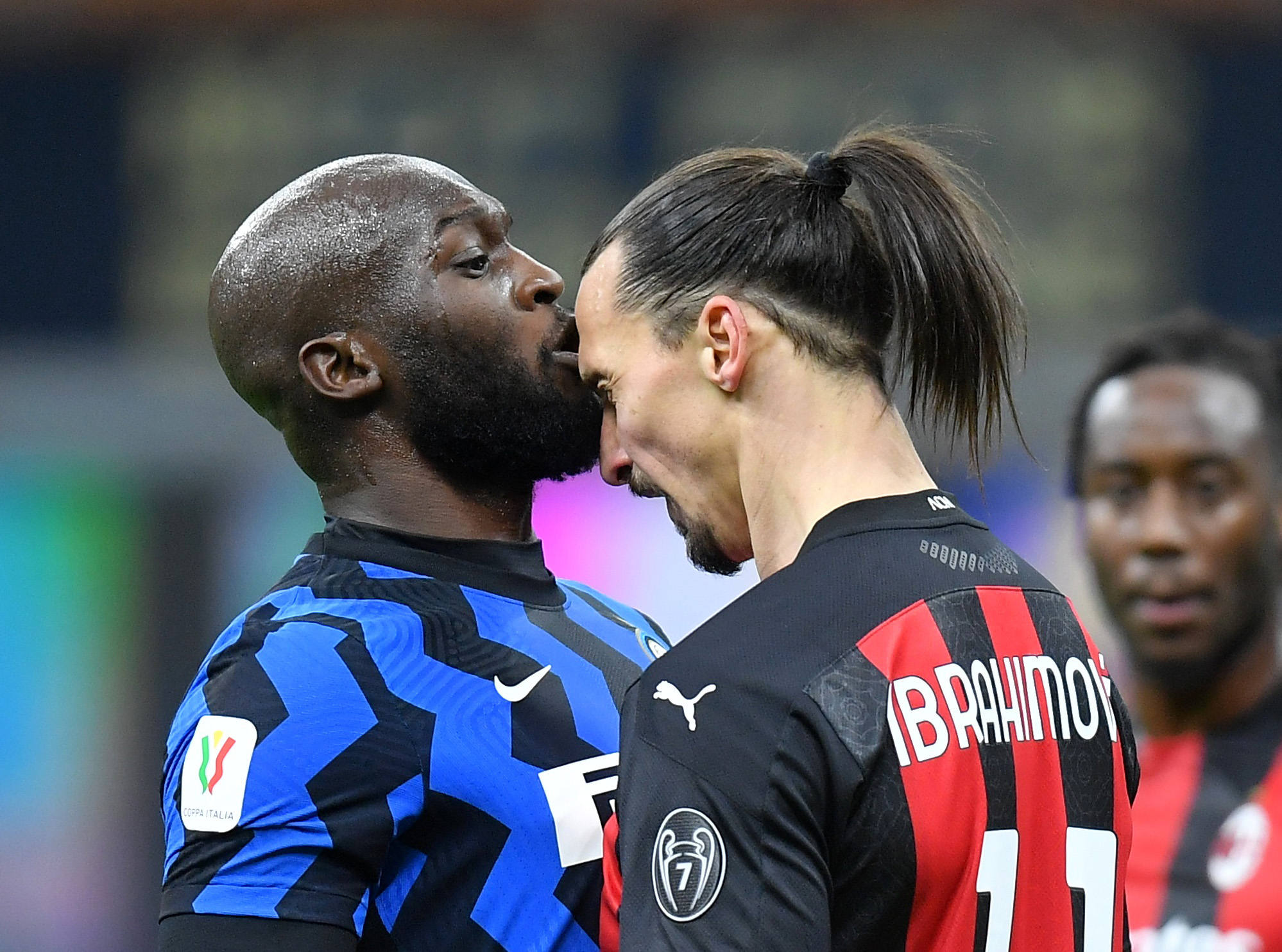 Soccer Football - Coppa Italia - Quarter Final - Inter Milan v AC Milan - San Siro, Milan, Italy - January 26, 2021 AC Milan's Zlatan Ibrahimovic clashes with Inter Milan's Romelu Lukaku REUTERS