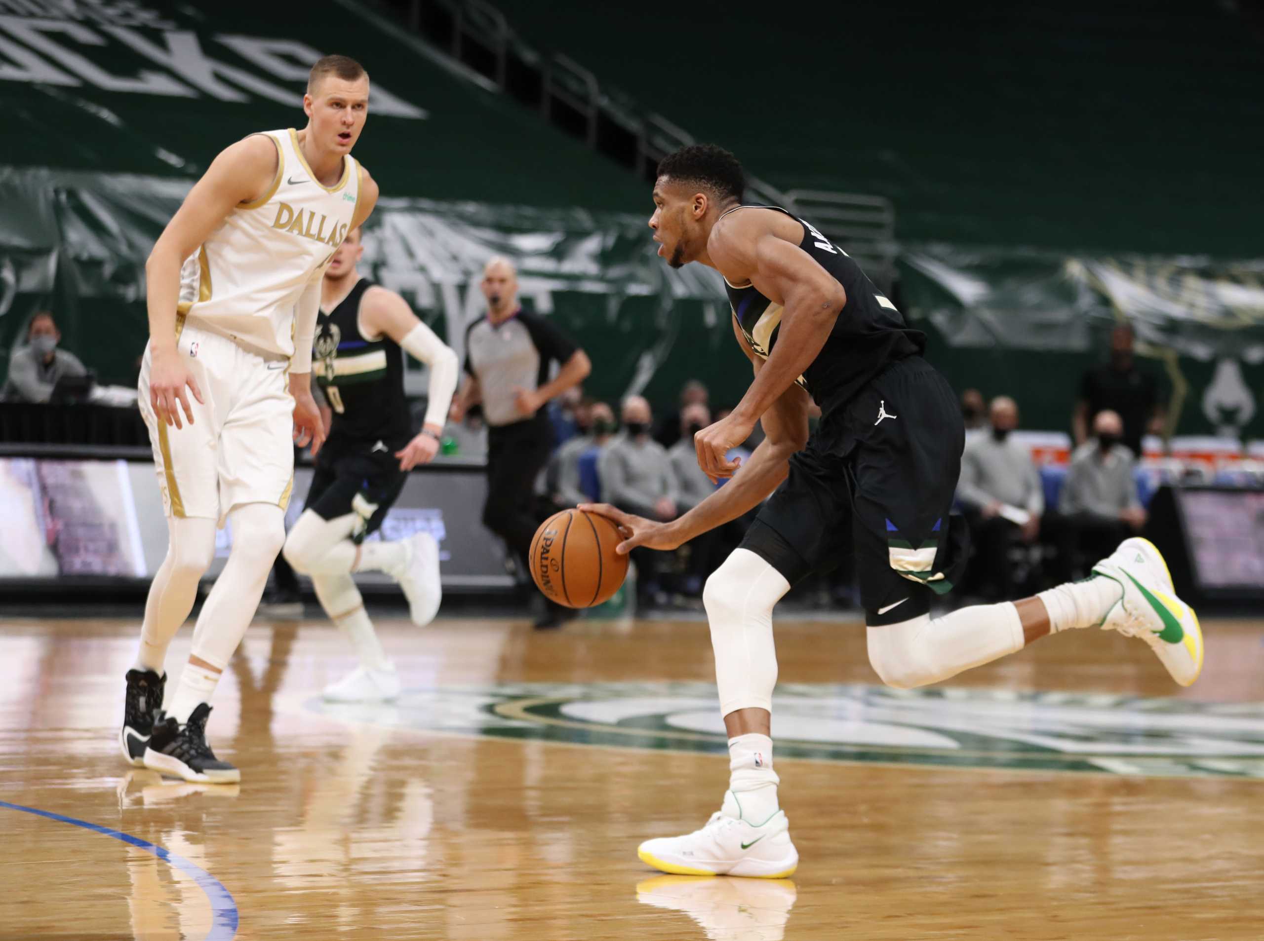 Jan 15, 2021; Milwaukee, WI, USA; Milwaukee Bucks forward Giannis Antetokounmpo (34) controls the ball against the Dallas Mavericks at the Bradley Center.  Mandatory Credit: Nick Monroe