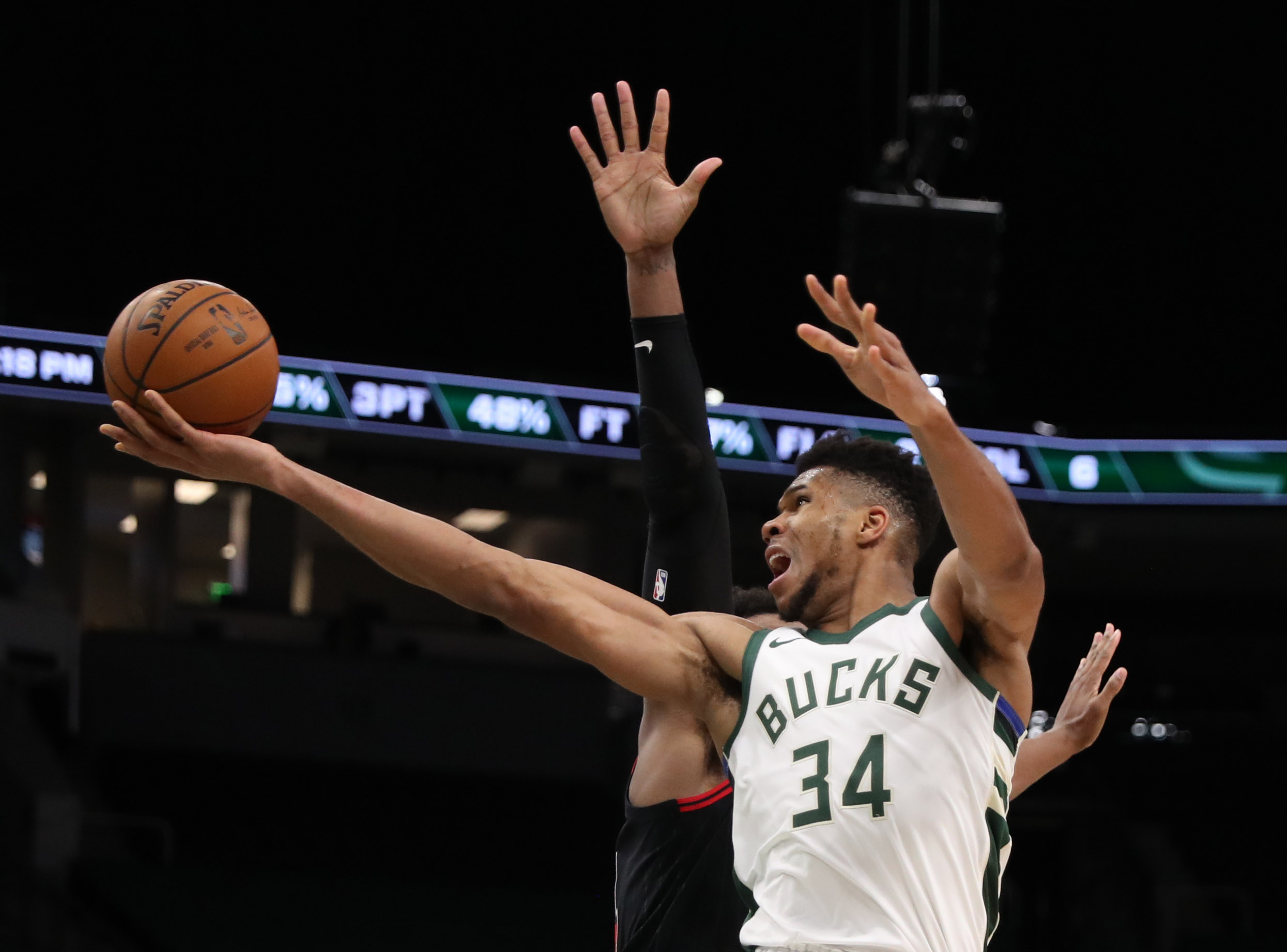 Jan 1, 2021; Milwaukee, WI, USA;  Milwaukee Bucks forward Giannis Antetokounmpo (34) shoots against the Chicago Bulls at the Bradley Center.  Mandatory Credit: Nick Monroe