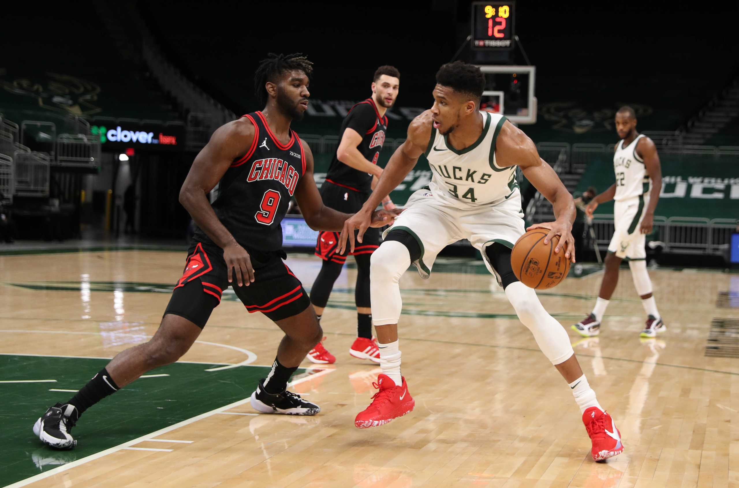 Jan 1, 2021; Milwaukee, WI, USA;  Milwaukee Bucks forward Giannis Antetokounmpo (34) dribbles against Chicago Bulls forward Patrick Williams (9) at the Bradley Center.  Mandatory Credit: Nick Monroe