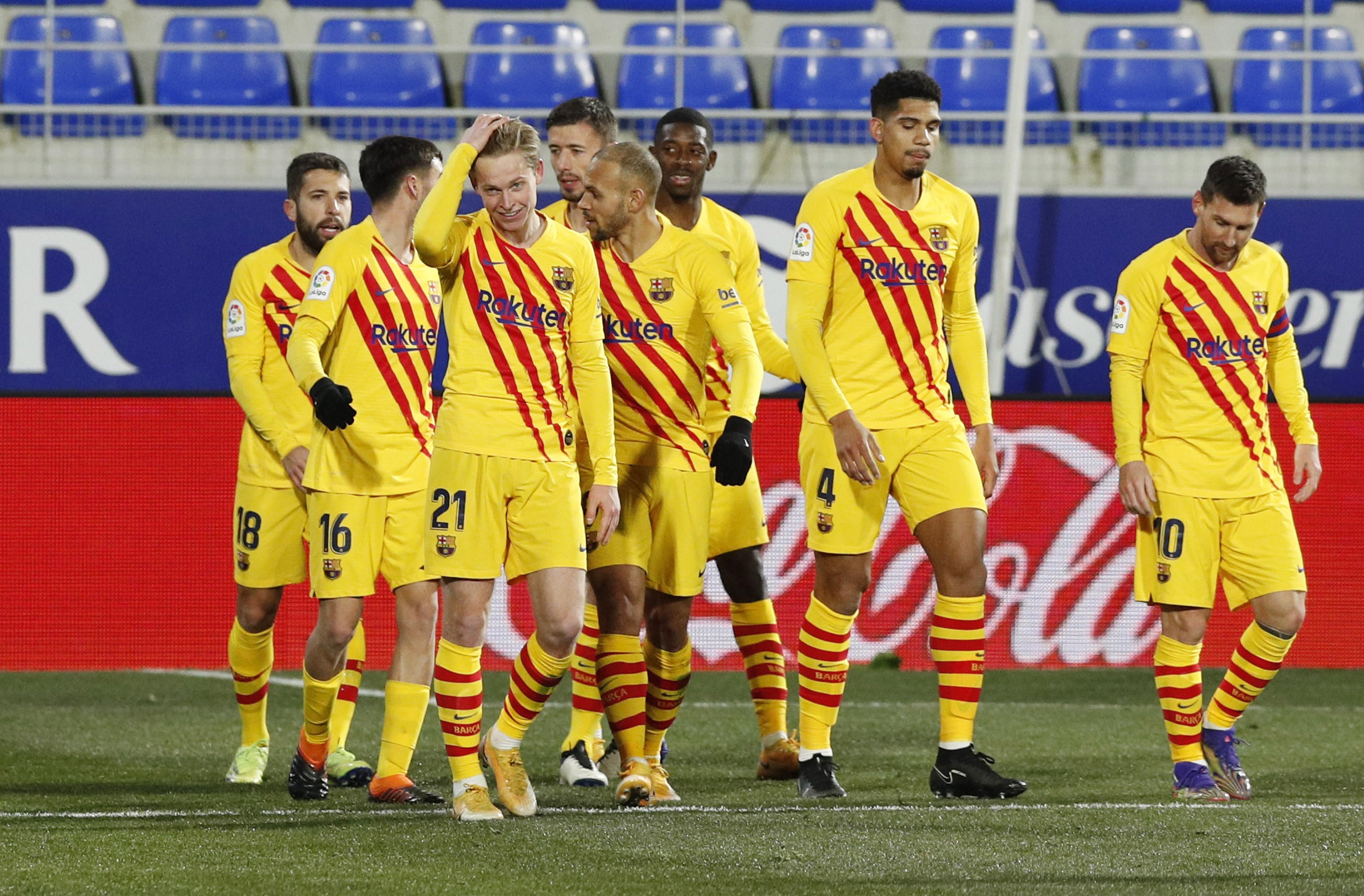 Soccer Football - La Liga Santander - SD Huesca v FC Barcelona - Estadio El Alcoraz, Huesca, Spain - January 3, 2021 Barcelona's Frenkie de Jong celebrates scoring their first goal with teammates REUTERS