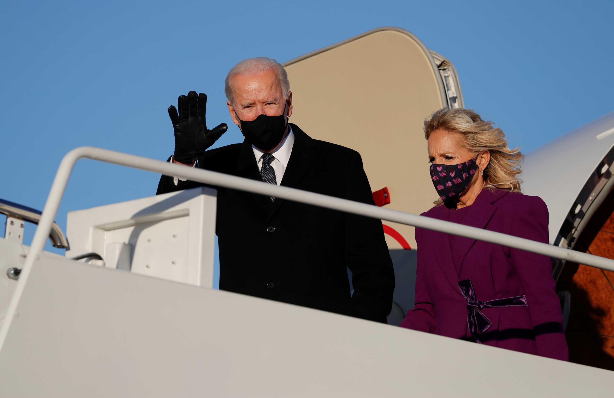U.S. President-elect Joe Biden and his wife Jill disembark a plane at Joint Base Andrews in Maryland, U.S. January 19, 2021. REUTERS