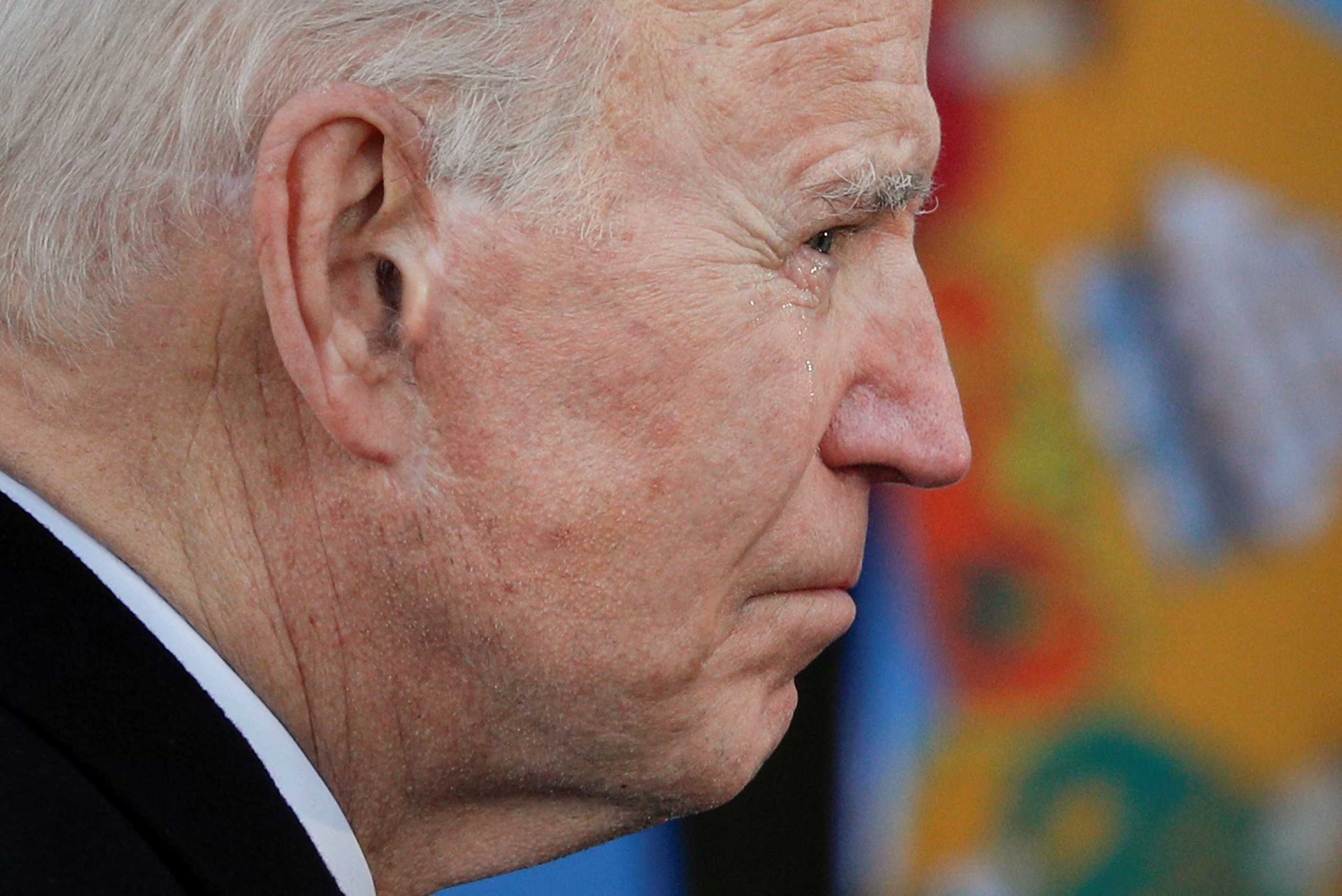 U.S. President-elect Joe Biden cries during an event at Major Joseph R. "Beau" Biden III National Guard