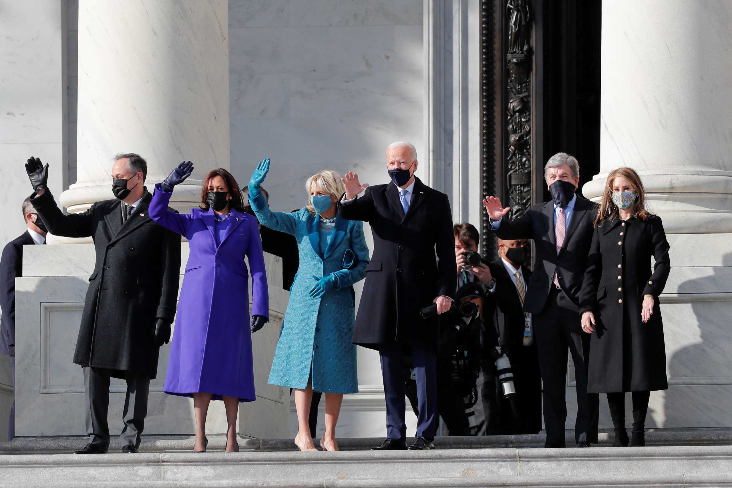 President-elect Joe Biden, his wife Jill Biden, Vice President-elect Kamala Harris, her husband Doug Emhoff, U.S. Senator Roy Blunt (R-MO) and his wife Abigail Blunt arrive ahead of the inauguration of Biden, in Washington, U.S., January 20, 2021. REUTERS