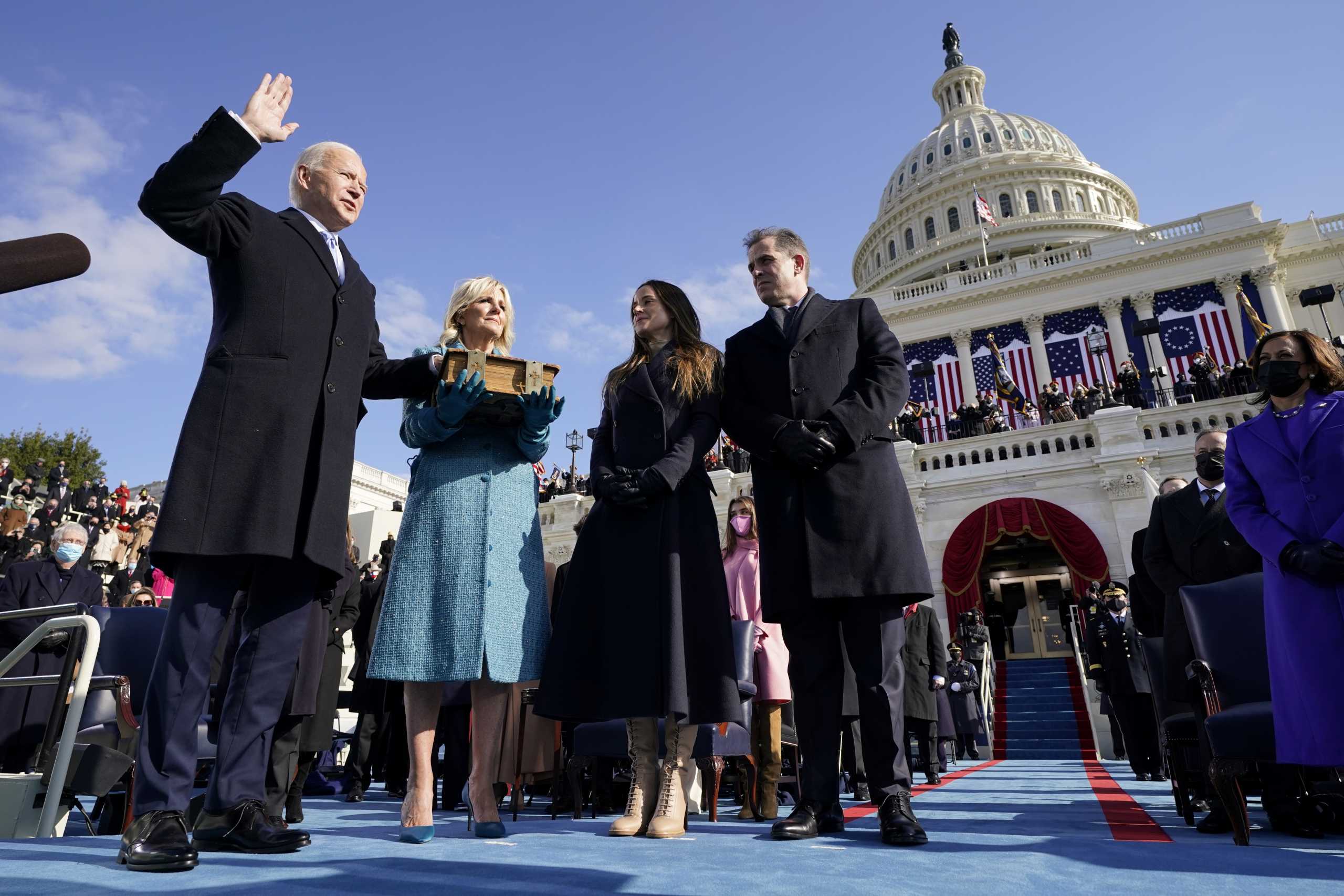 Joe Biden is sworn in as the 46th president of the United States by Chief Justice John Roberts as Jill Biden holds the Bible during the 59th Presidential Inauguration at the U.S. Capitol in Washington, U.S., January 20, 2021. Andrew Harnik