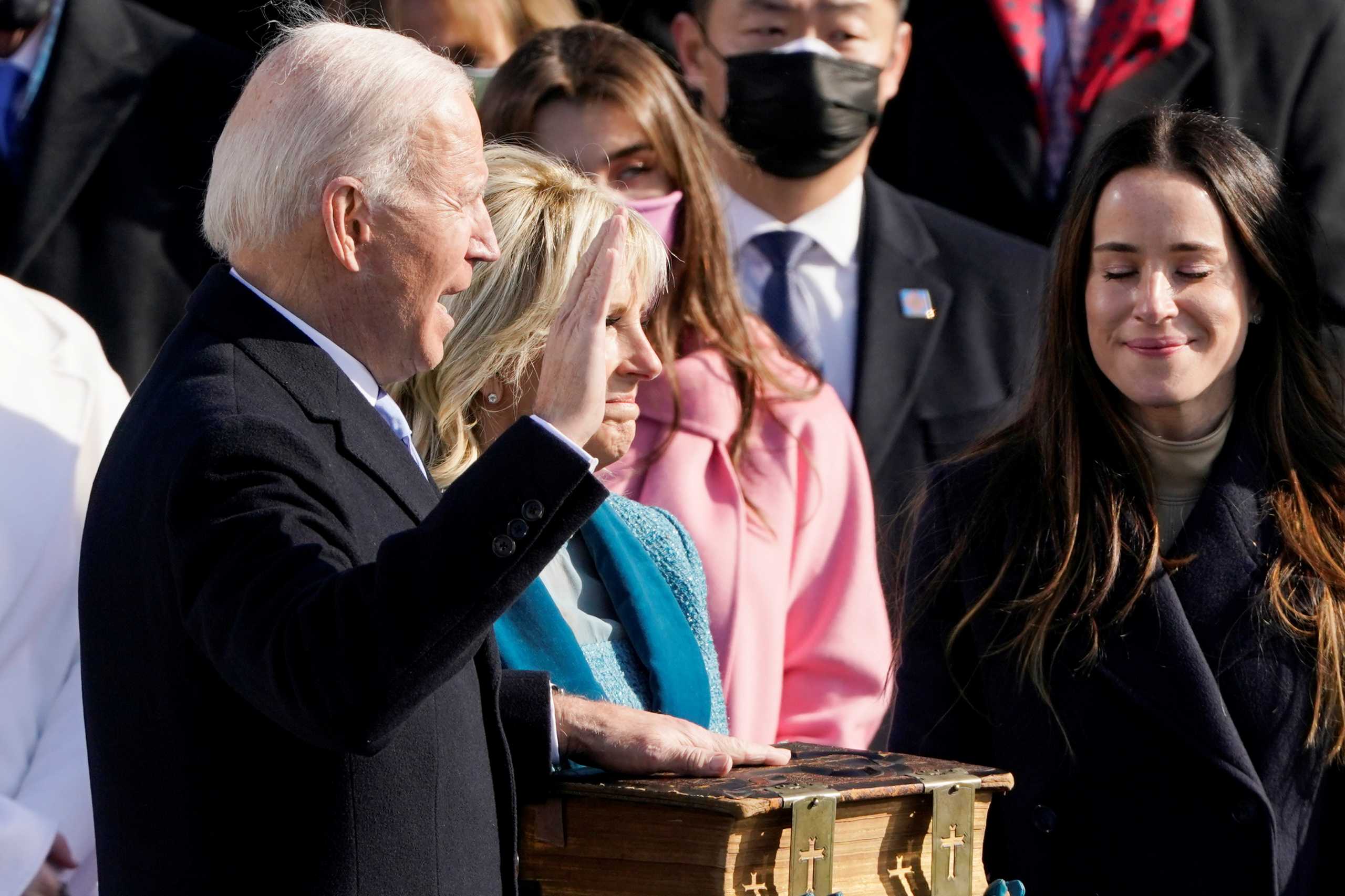 Joe Biden is sworn in as the 46th president of the United States by Chief Justice John Roberts as Jill Biden holds the Bible during the 59th Presidential Inauguration at the U.S. Capitol in Washington, U.S., January 20, 2021. Patrick Semansky