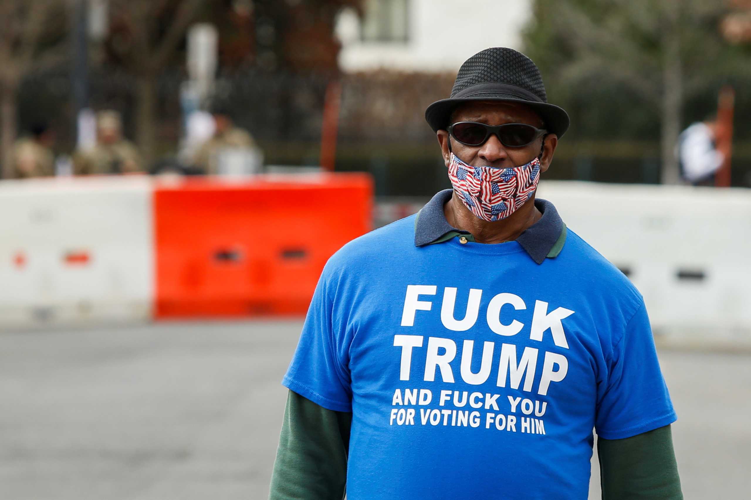 A man walks around the Capitol ahead of U.S. President-elect Joe Biden's inauguration, in Washington, U.S., January 17, 2021. REUTERS