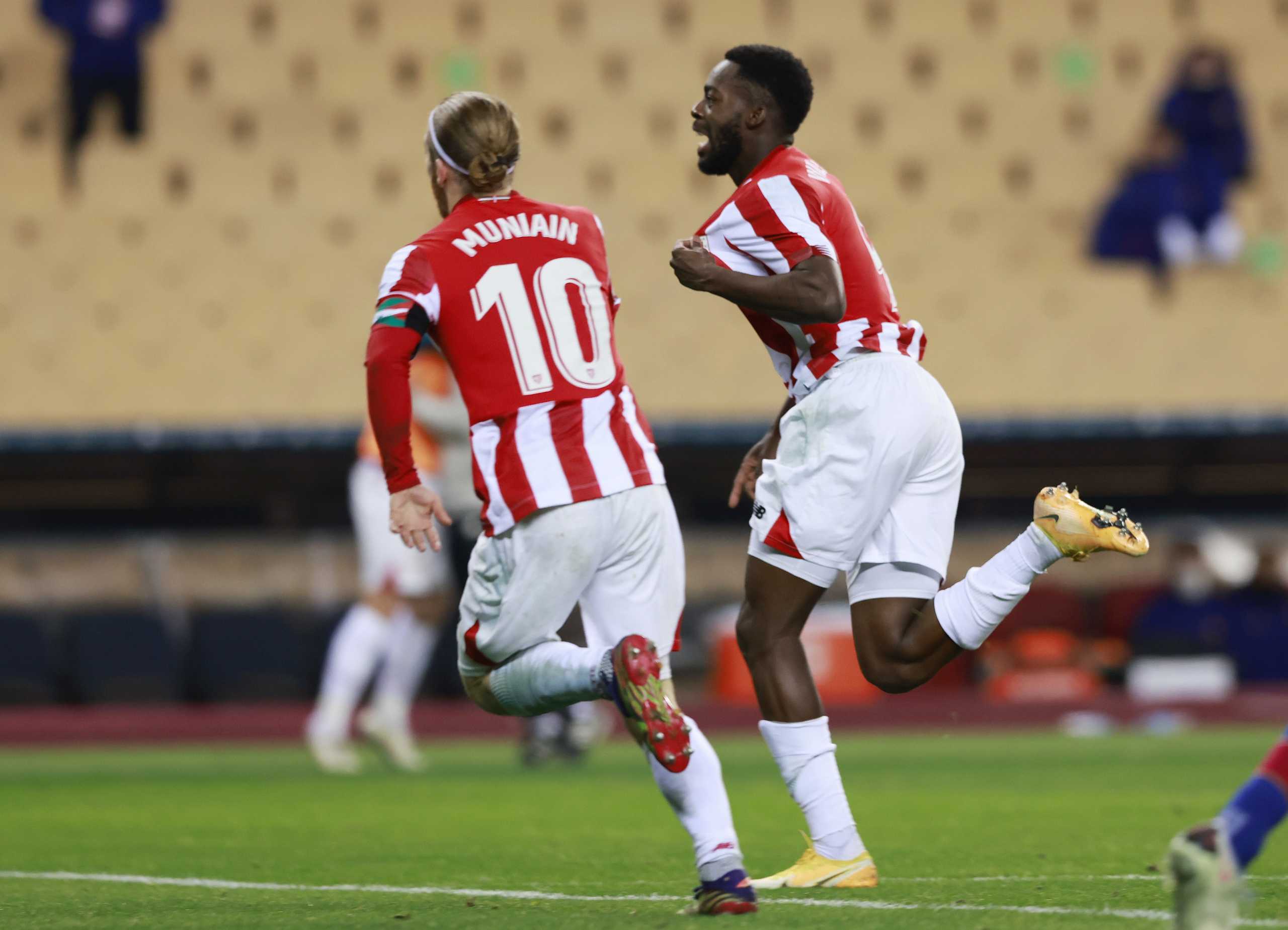 Soccer Football - Spanish Super Cup Final - FC Barcelona v Athletic Bilbao - Estadio La Cartuja de Sevilla, Seville, Spain - January 17, 2021 Athletic Bilbao's Inaki Williams celebrates scoring their third goal with Iker Muniain REUTERS