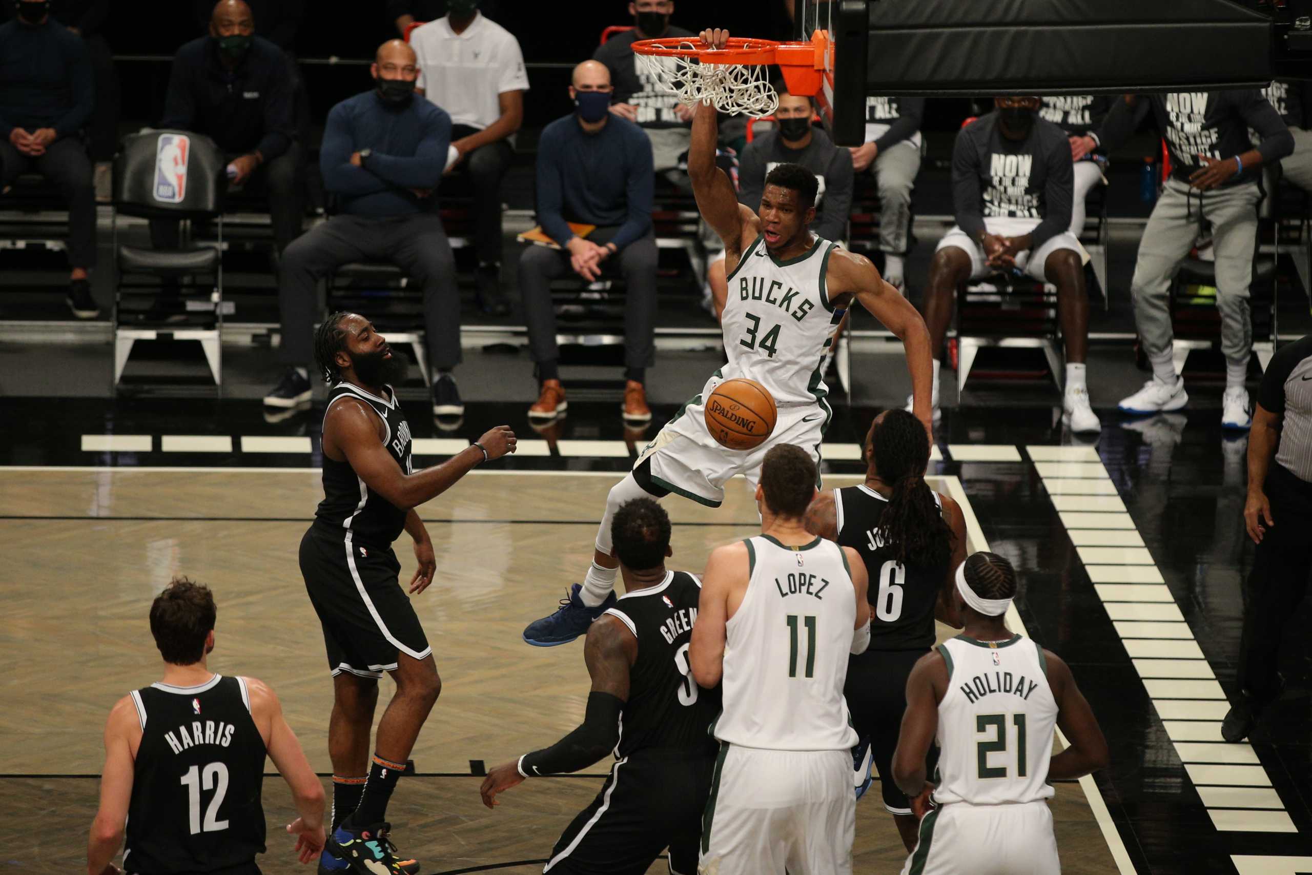Jan 18, 2021; Brooklyn, New York, USA; Milwaukee Bucks power forward Giannis Antetokounmpo (34) dunks against the Brooklyn Nets during the third quarter at Barclays Center. Mandatory Credit: Brad Penner-USA TODAY Sports