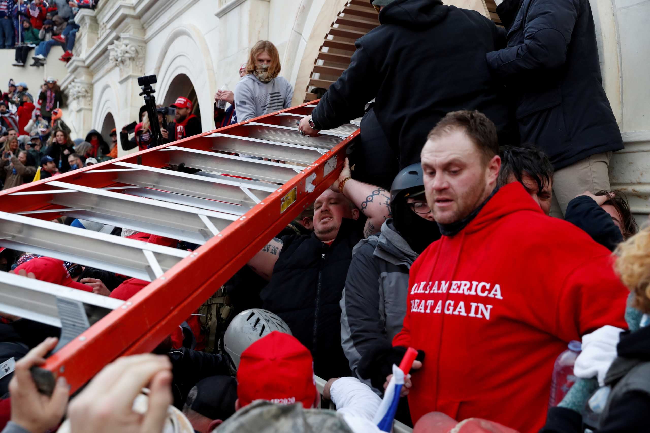 FILE PHOTO: Pro-Trump protesters storm into the U.S. Capitol during clashes with police, during a rally to contest the certification of the 2020 U.S. presidential election results by the U.S. Congress, in Washington, U.S, January 6, 2021. REUTERS
