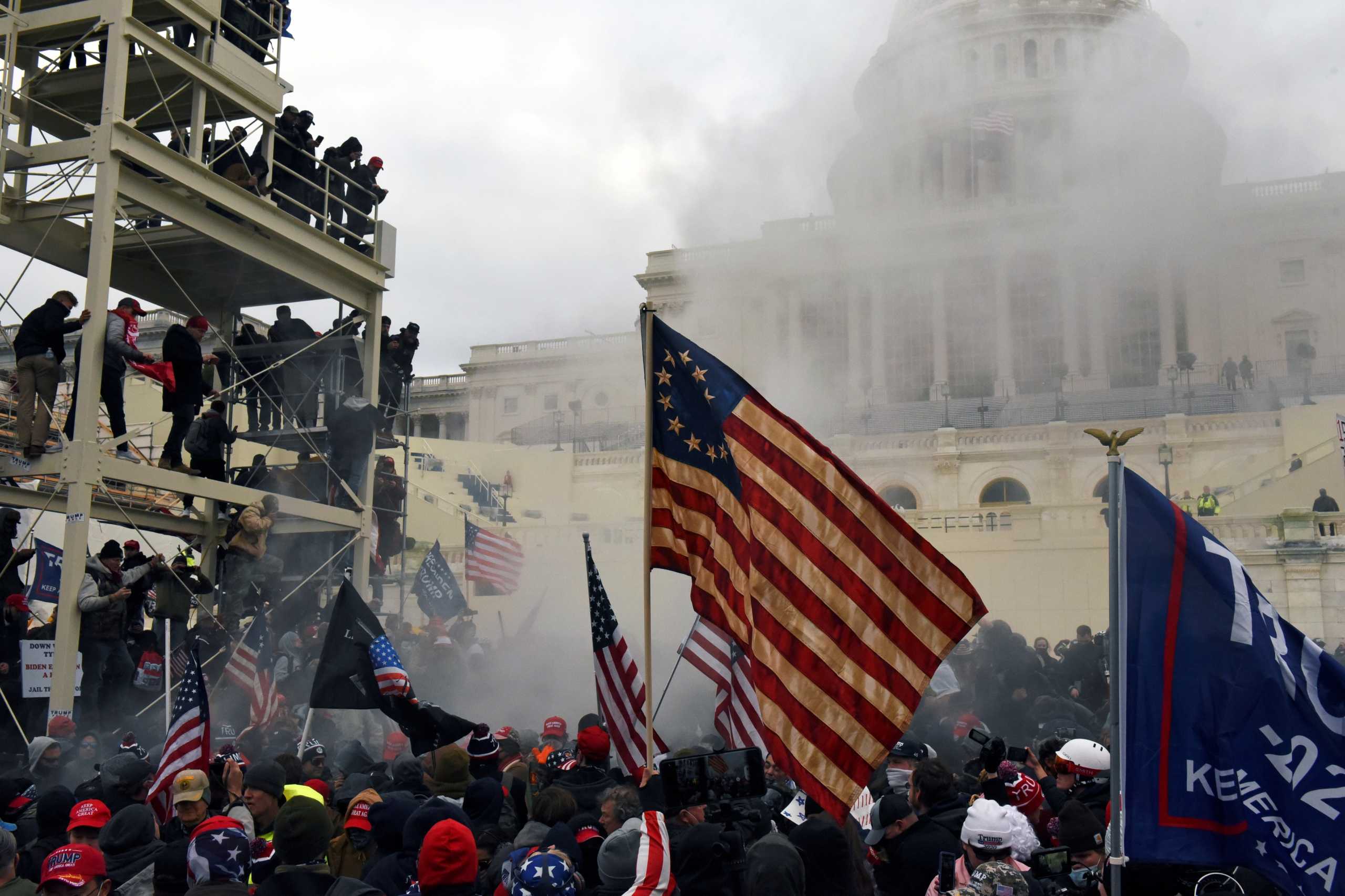 FILE PHOTO: Supporters of U.S. President Donald Trump protest in front of the U.S. Capitol Building in Washington, U.S. January 6, 2021. REUTERS