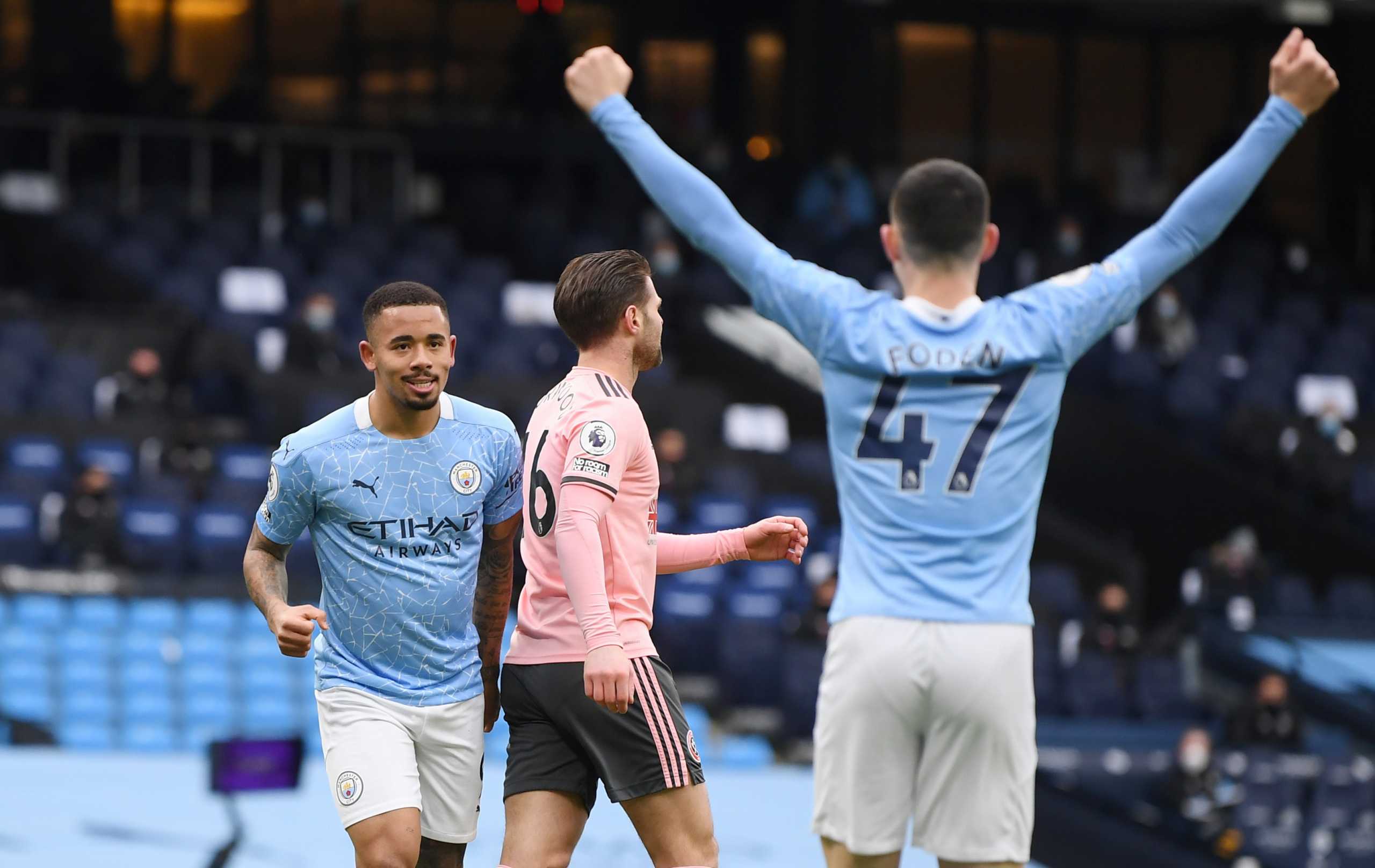 Soccer Football - Premier League - Manchester City v Sheffield United - Etihad Stadium, Manchester, Britain - January 30, 2021 Manchester City's Gabriel Jesus celebrates scoring their first goal with teammate Phil Foden Pool via REUTERS