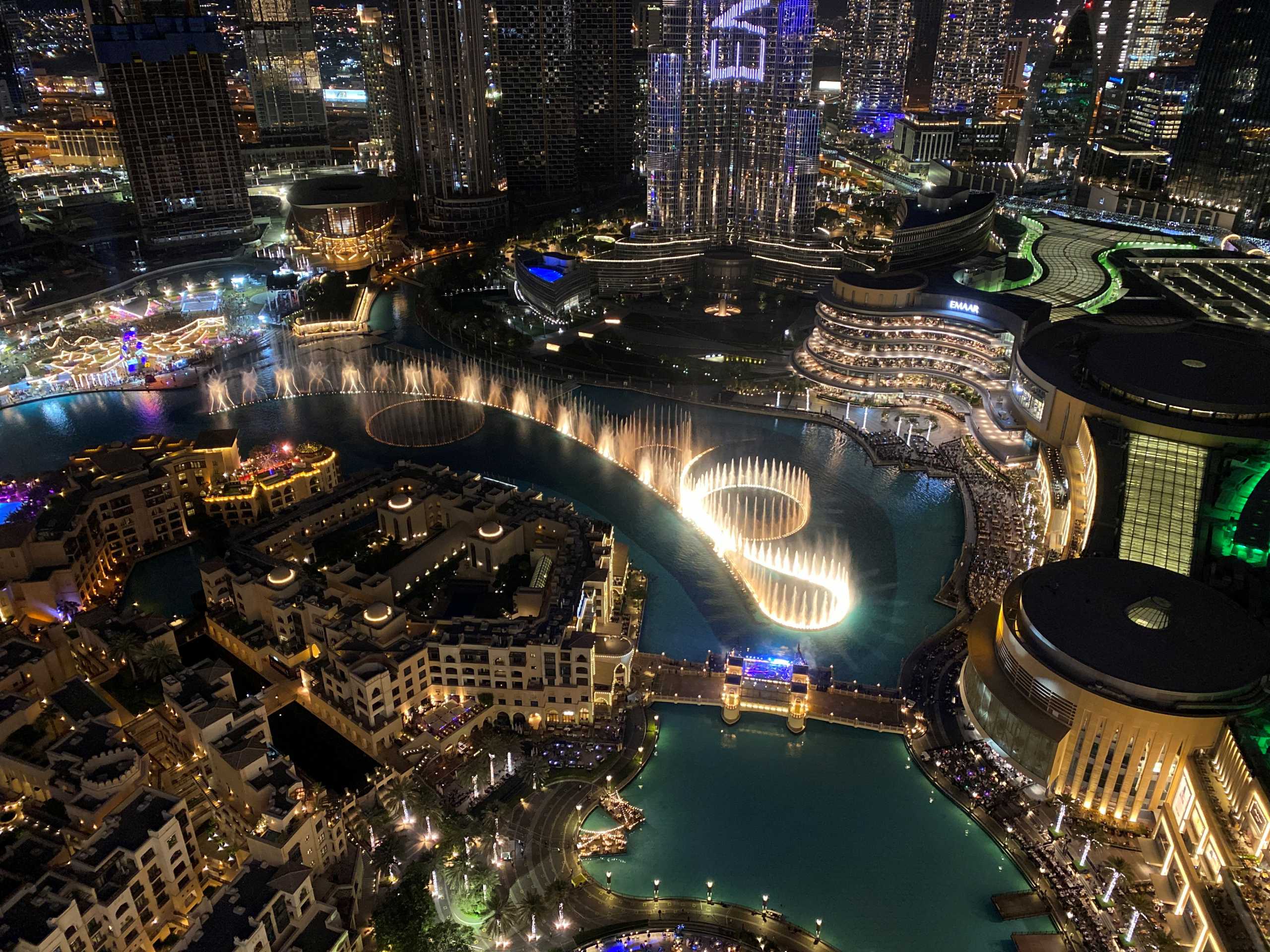 A general view shows the musical fountain in front of the Burj Khalifa, the tallest building in the world, in Dubai, United Arab Emirates, December 31, 2020. REUTERS