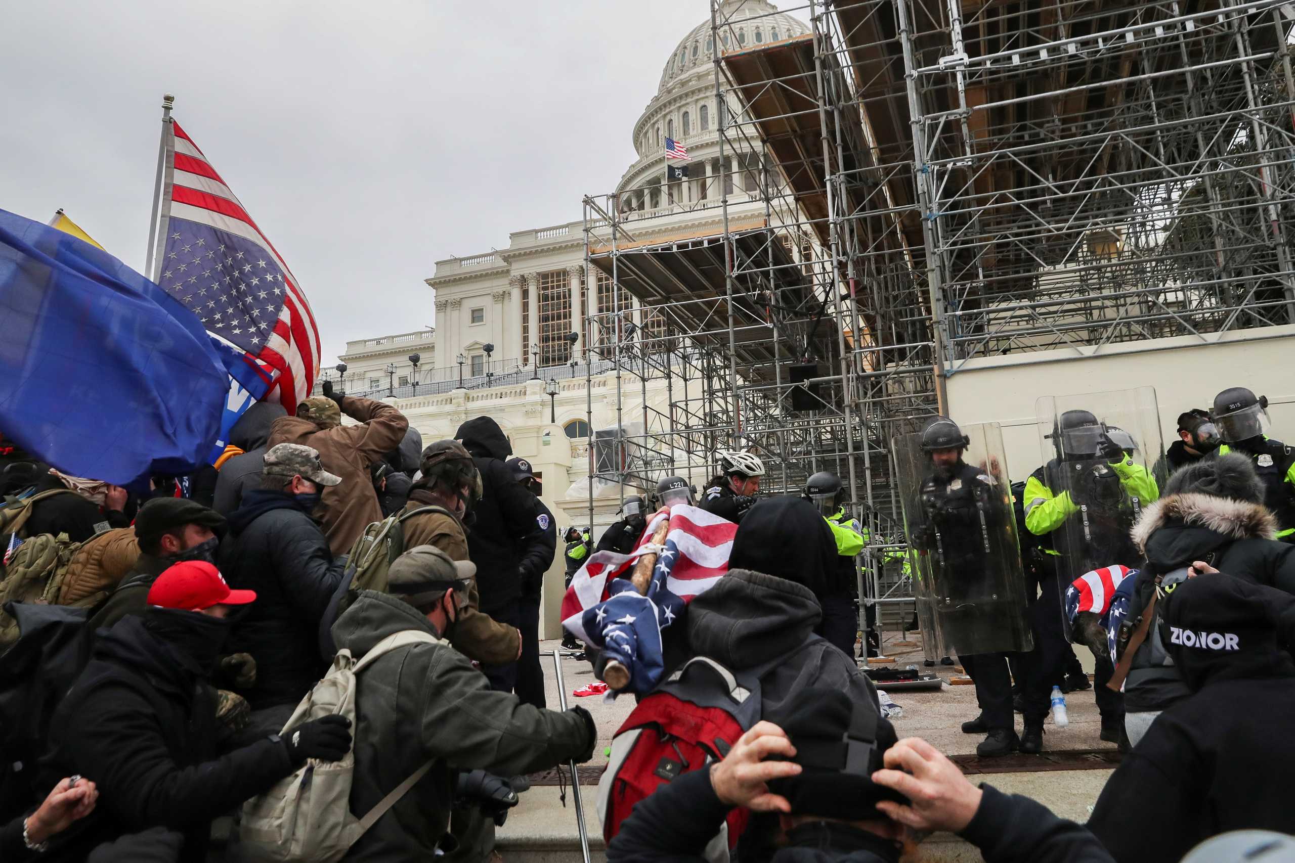 Supporters of U.S. President Donald Trump gather in front of the U.S. Capitol Building in Washington, U.S., January 6, 2021. REUTERS