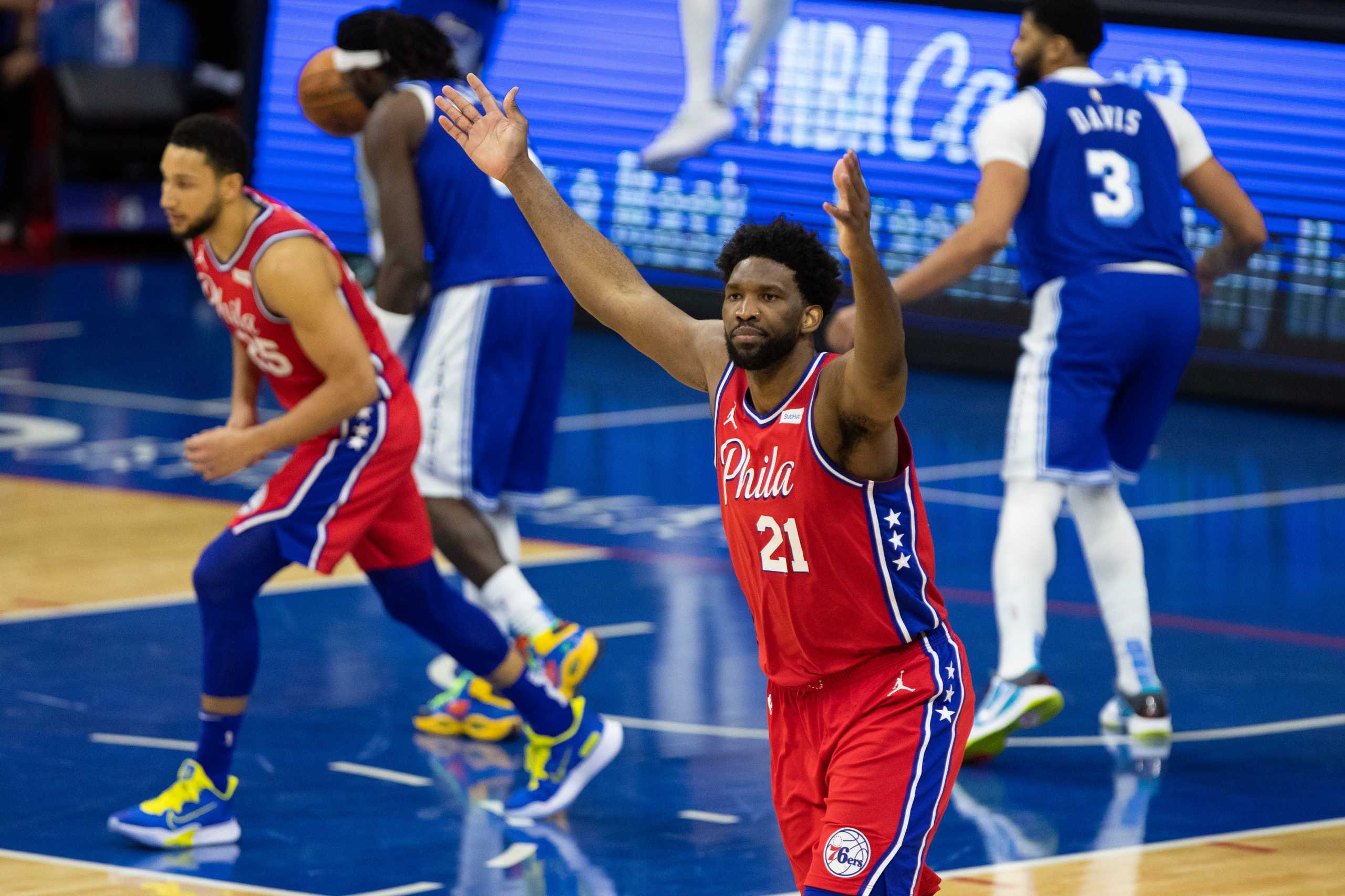 Jan 27, 2021; Philadelphia, Pennsylvania, USA; Philadelphia 76ers center Joel Embiid (21) reacts after his score against the Los Angeles Lakers during the fourth quarter at Wells Fargo Center. Mandatory Credit: Bill Streicher-USA TODAY Sports