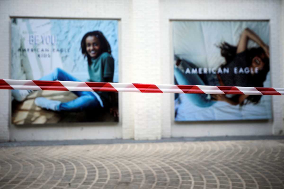 Police barrier tape is seen in a fashion shopping center as Israel tightens a national lockdown in a bid to curb a sharp rise in new coronavirus disease (COVID-19) infections in Ashdod, Israel January 8, 2021. REUTERS