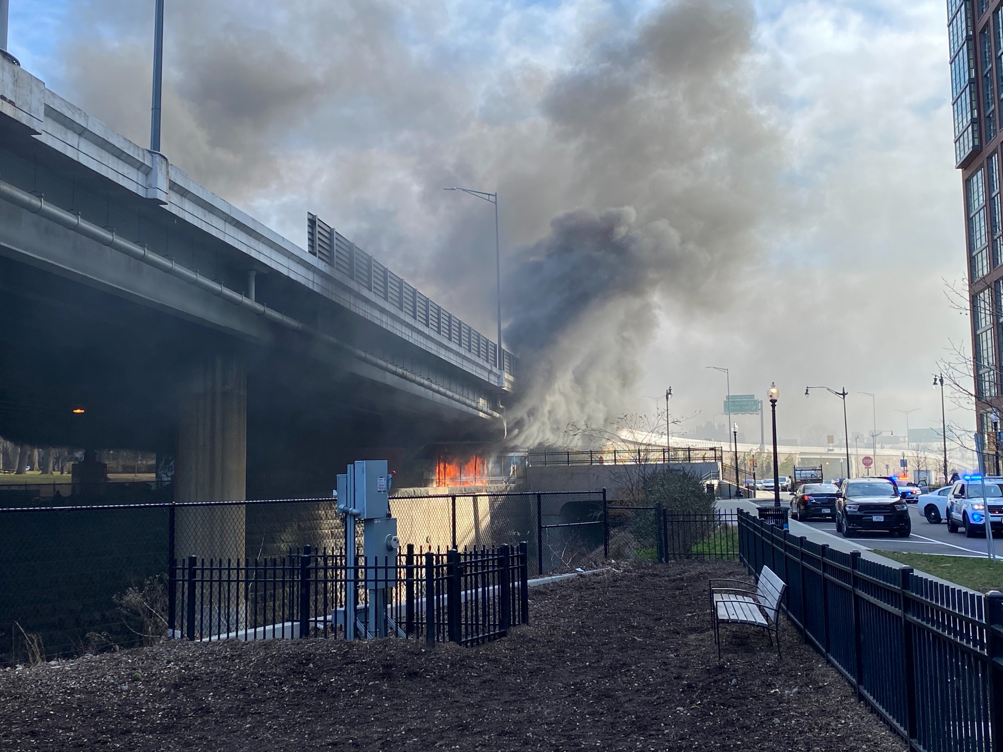A fire burns under a bridge in Washington, DC, U.S. January 18, 2021, in this picture obtained from social media. Edward Daniels via REUTERS THIS IMAGE HAS BEEN SUPPLIED BY A THIRD PARTY. MANDATORY CREDIT. NO RESALES. NO ARCHIVES
