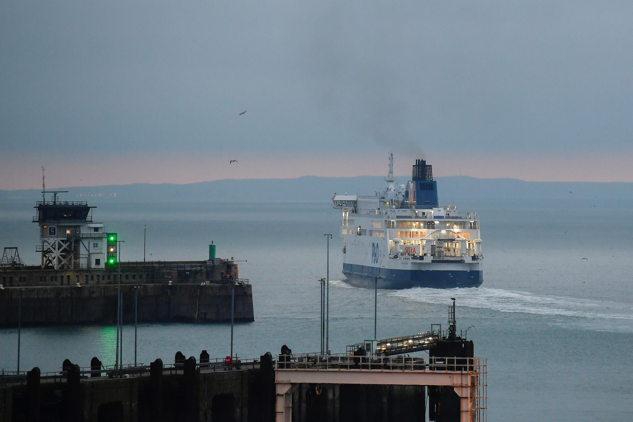 A cross channel ferry departs the Port of Dover heading for France, at dawn on the first day following the end of the Brexit transition period, Dover, Britain, January 1, 2021. REUTERS