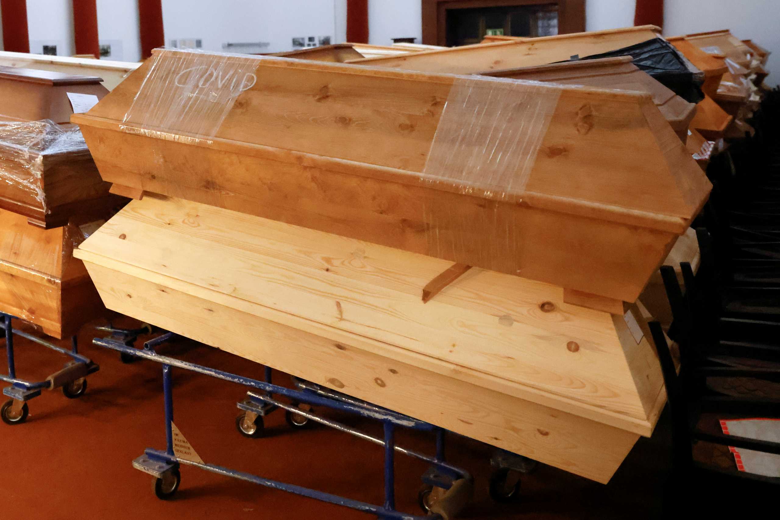 Coffins of people who passed away due to the coronavirus disease (COVID-19) are seen in the Meissen crematorium, amid the COVID-19 pandemic in Meissen, Germany, January 15, 2021. REUTERS