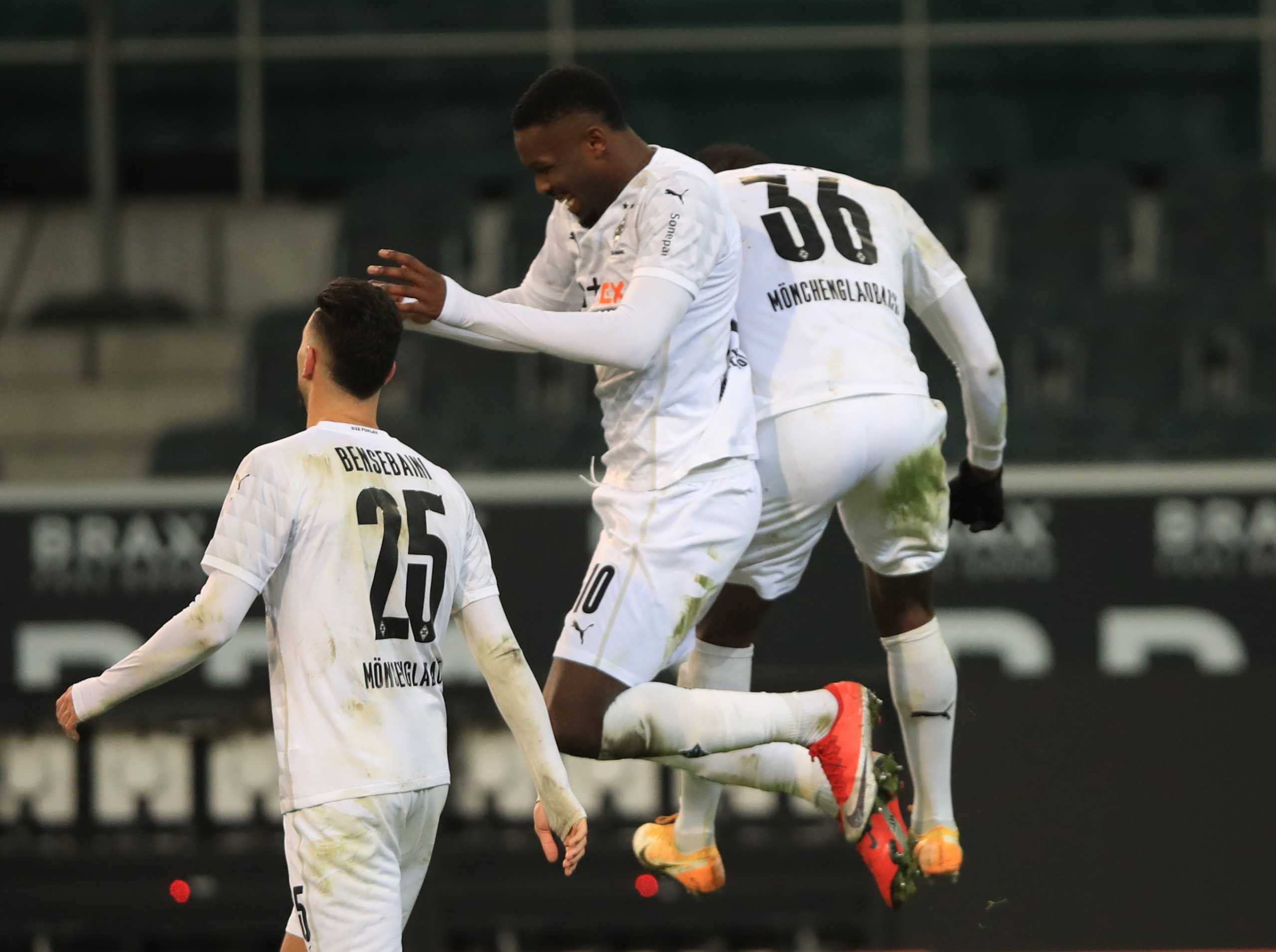 Soccer Football - Bundesliga - Borussia Moenchengladbach v Borussia Dortmund - Borussia-Park, Moenchengladbach, Germany - January 22, 2021 Borussia Moenchengladbach's Marcus Thuram celebrates scoring their fourth goal Breel Embolo Pool via REUTERS