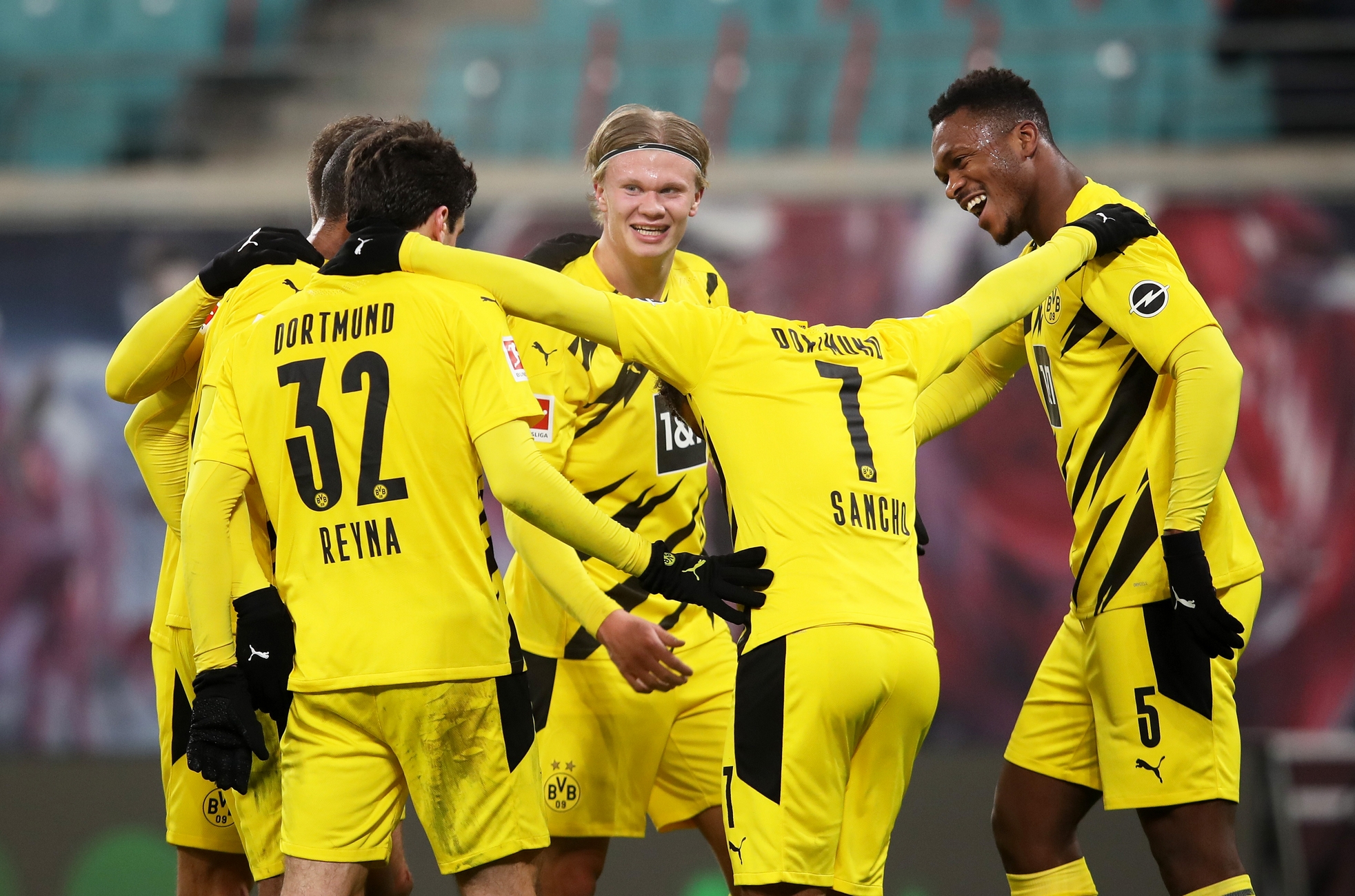 Soccer Football - Bundesliga - RB Leipzig v Borussia Dortmund - Red Bull Arena, Leipzig, Germany - January 9, 2021 Borussia Dortmund's Erling Braut Haaland celebrates scoring their third goal with teammates Pool via REUTERS