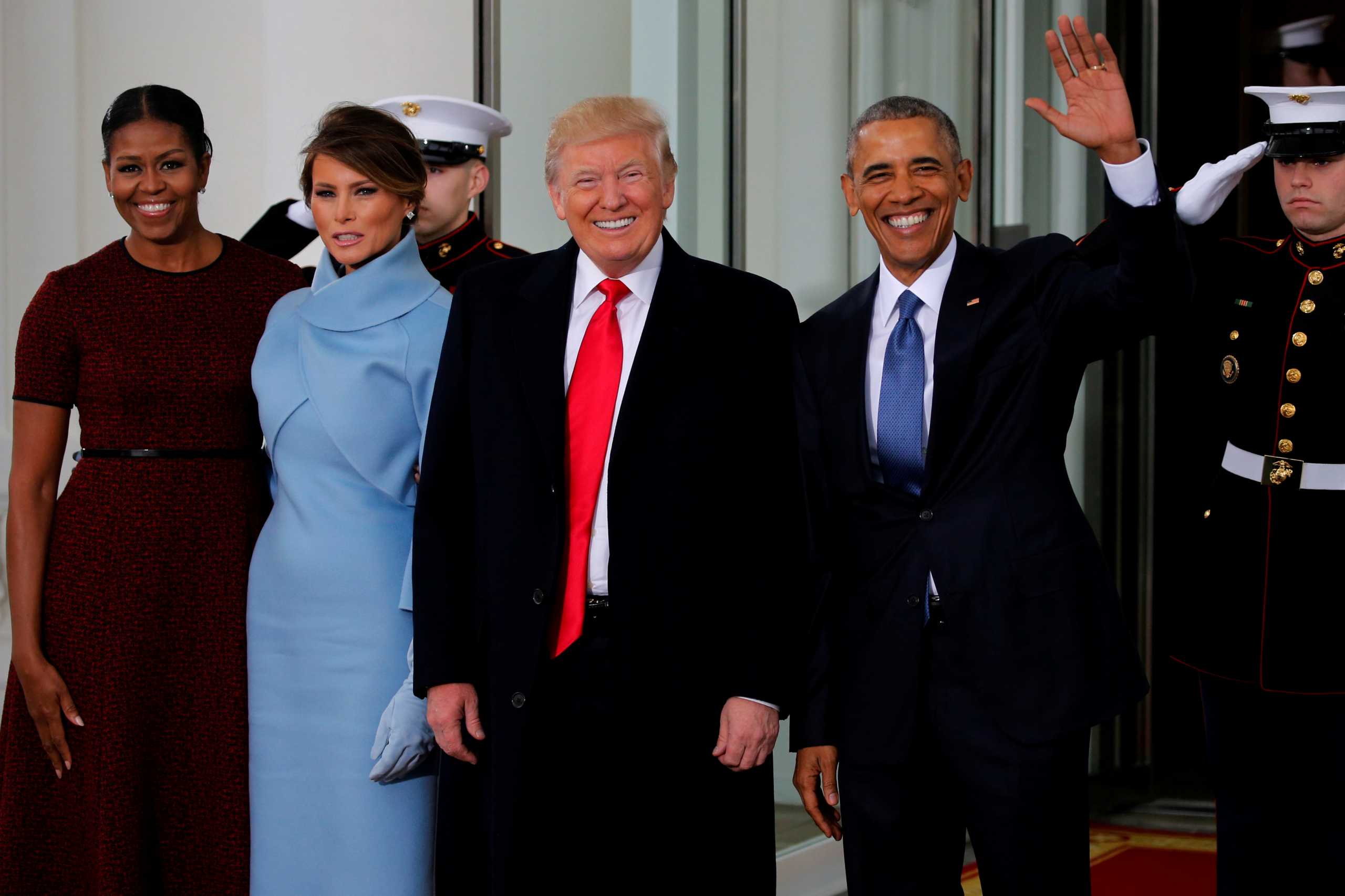 FILE PHOTO: U.S. President Barack Obama (R) and first lady Michelle Obama (L) greet U.S. President-elect Donald Trump and his wife Melania for tea before the inauguration at the White House in Washington, U.S. January 20, 2017. REUTERS