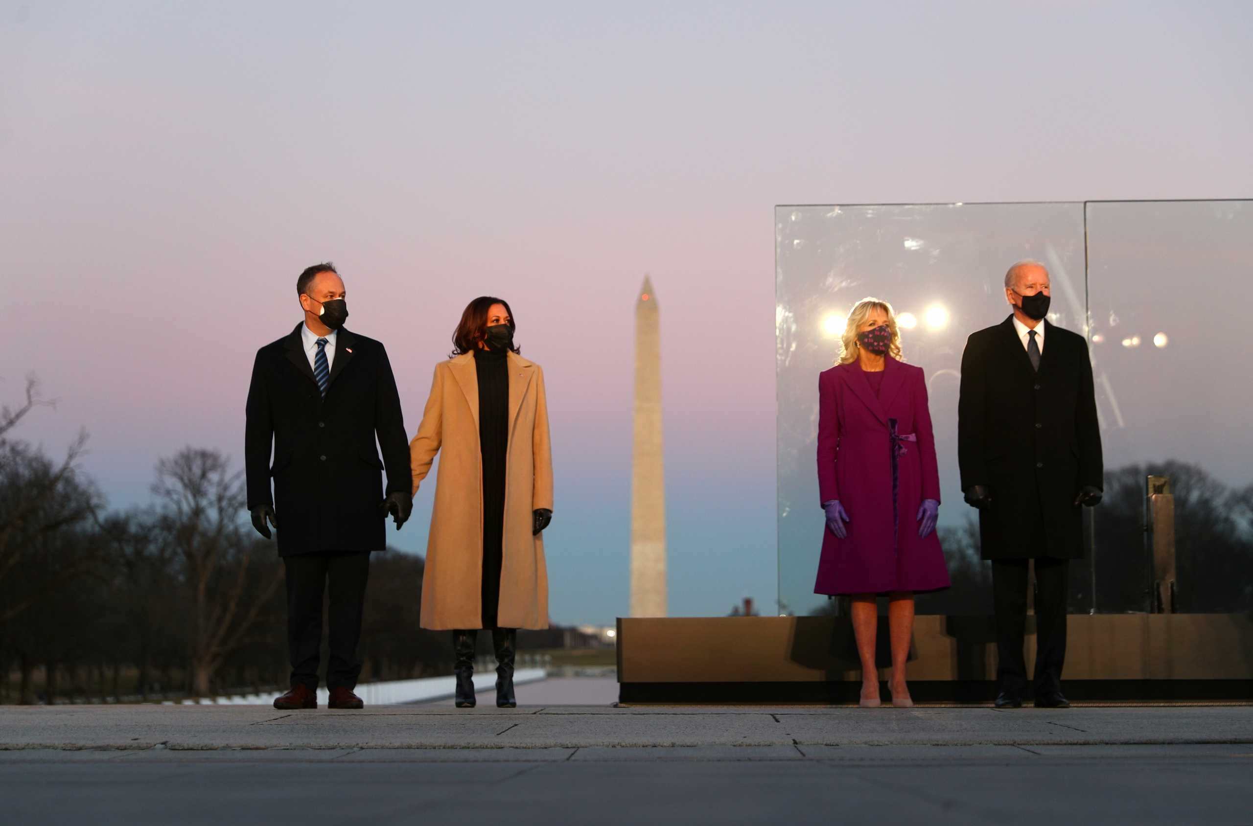 U.S. President-elect Joe Biden, his wife Jill Biden, Vice President-elect Kamala Harris and her husband Doug Emhoff attend a coronavirus disease (COVID-19) memorial event at the Lincoln Memorial in Washington, U.S. January 19, 2021. REUTERS