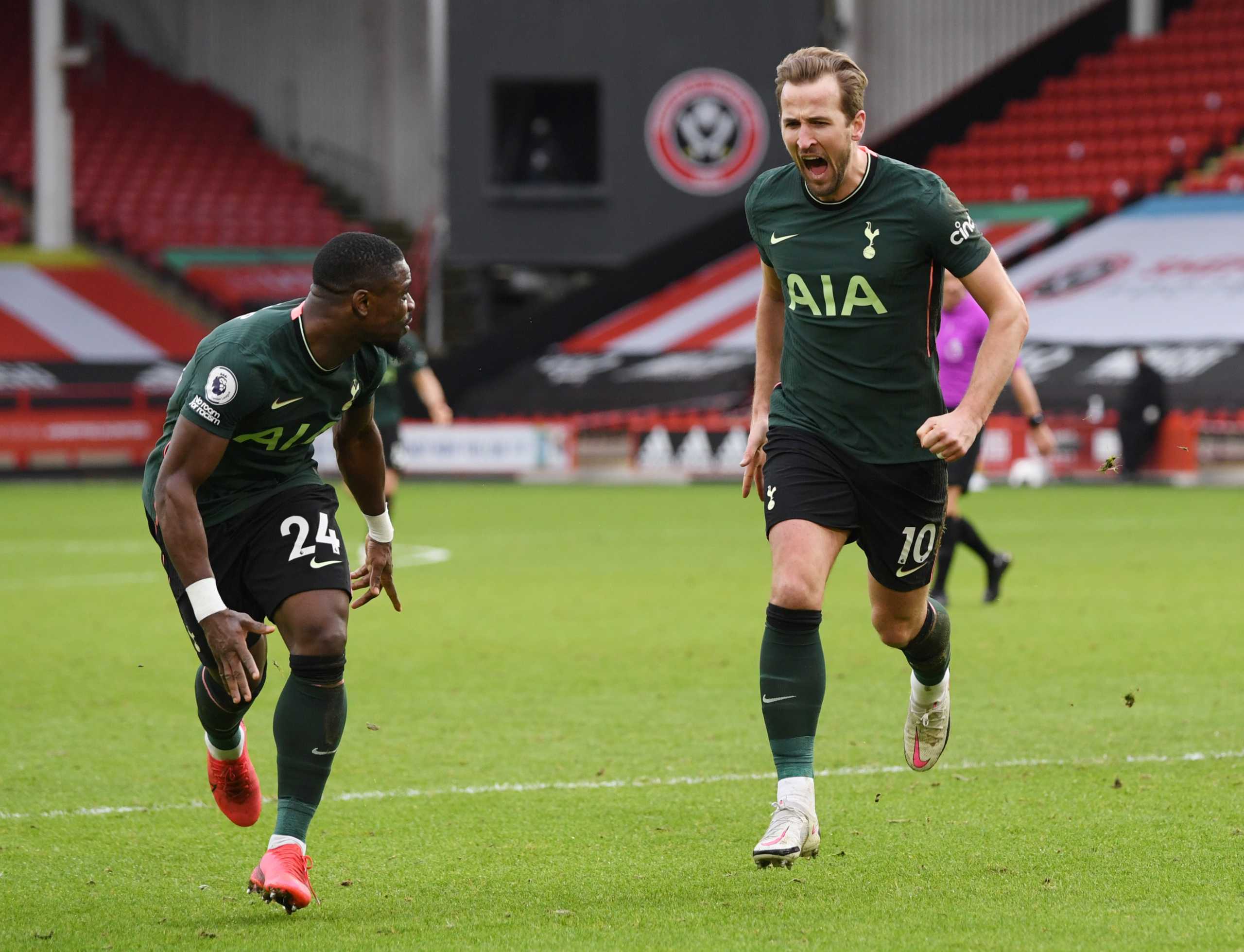 Soccer Football - Premier League - Sheffield United v Tottenham Hotspur - Bramall Lane, Sheffield, Britain - January 17, 2021 Tottenham Hotspur's Harry Kane celebrates scoring their second goal with Serge Aurier Pool via REUTERS