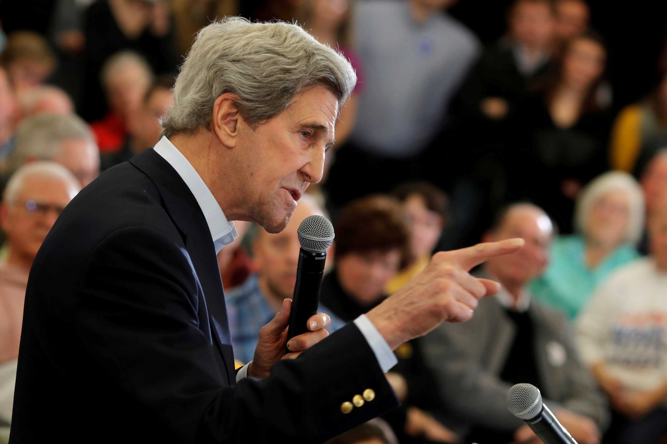 FILE PHOTO: Former U.S. Secretary of State John Kerry speaks during a campaign event in support of Democratic 2020 U.S. presidential candidate and former Vice President Joe Biden in North Libery, Iowa, U.S., February 1, 2020. REUTERS