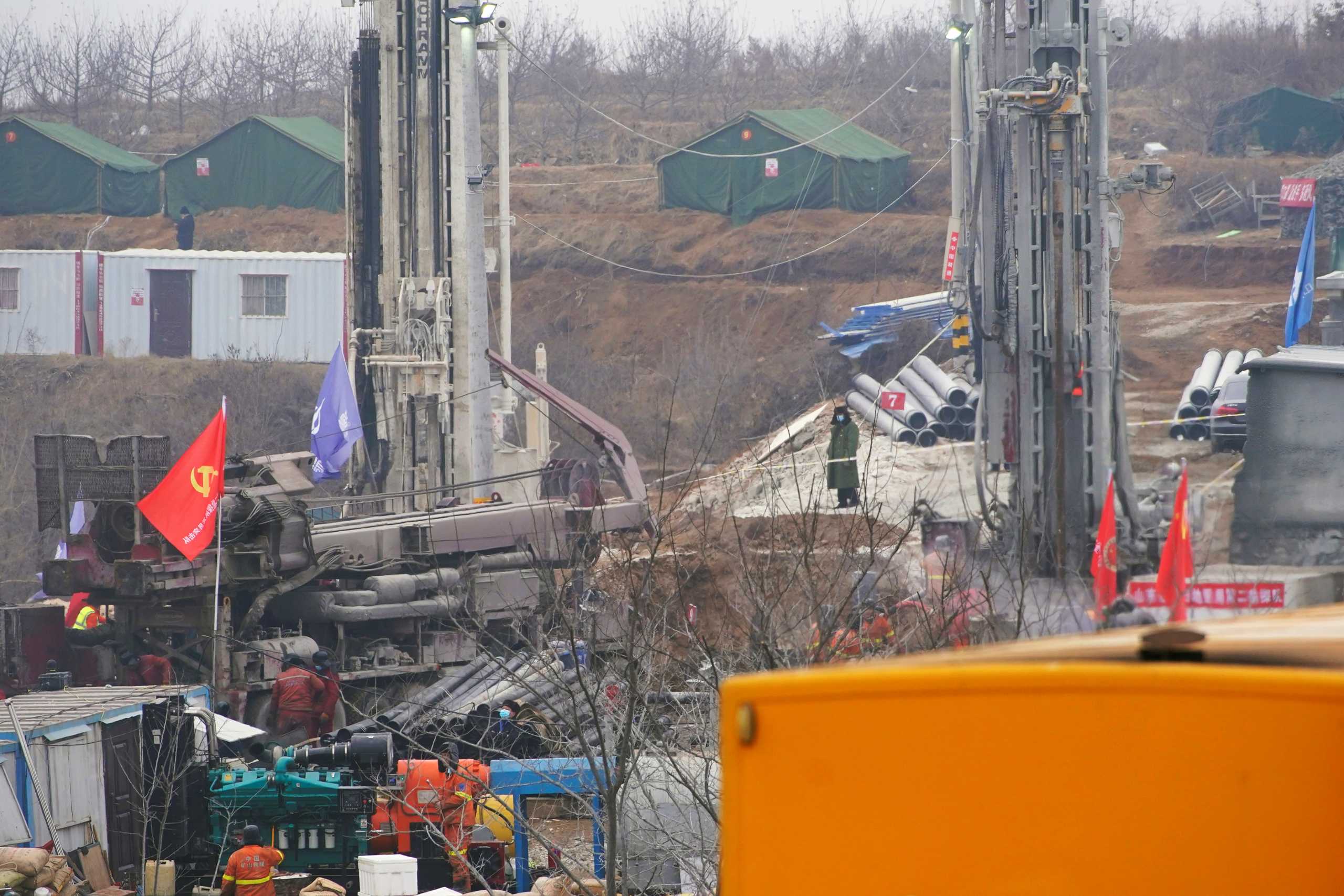 Rescuers work at the Hushan gold mine where workers were trapped underground after the Jan. 10 explosion, in Qixia, Shandong province, China January 22, 2021. REUTERS
