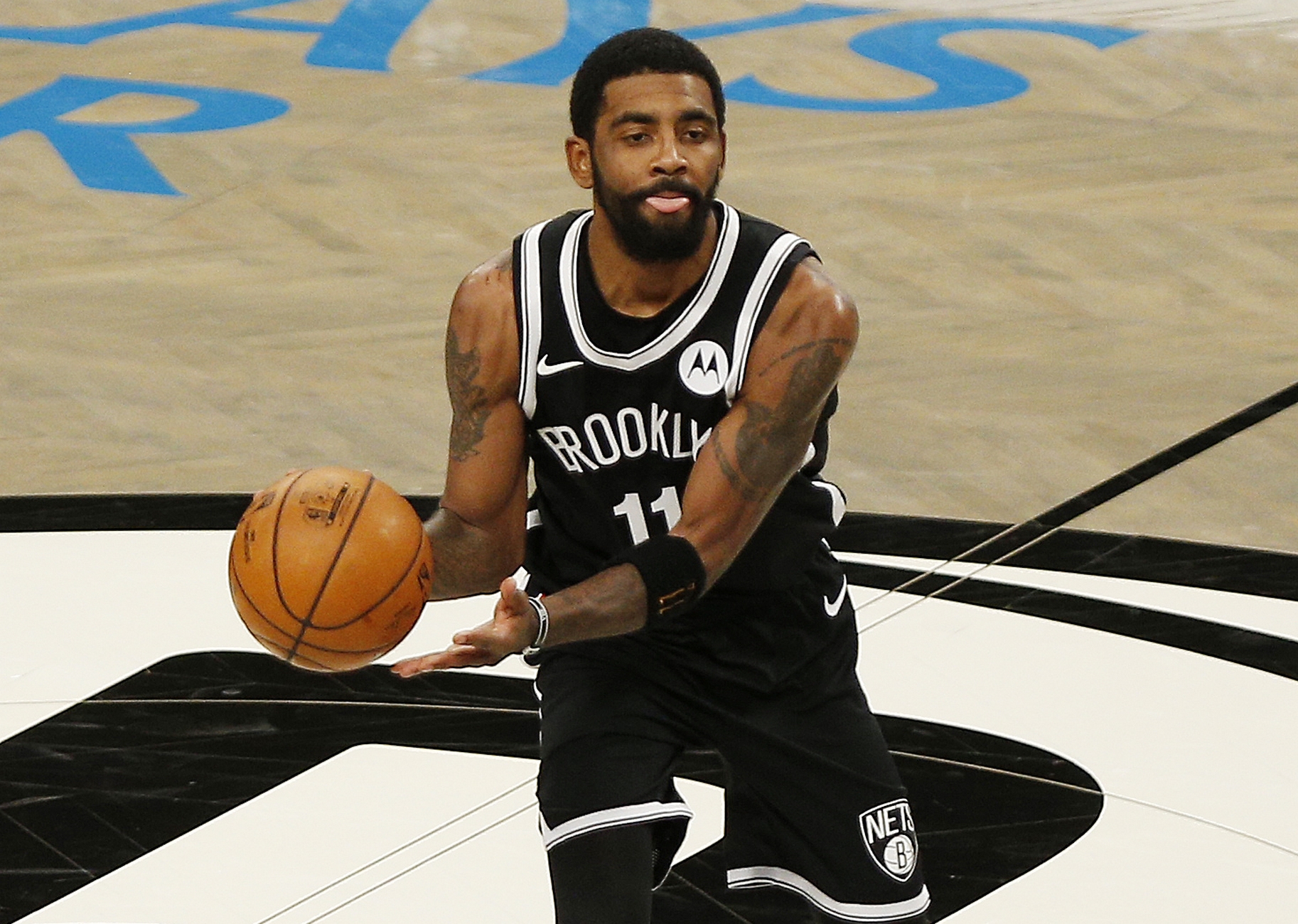 Jan 5, 2021; Brooklyn, New York, USA; Brooklyn Nets guard Kyrie Irving (11) dribbles the ball against the Utah Jazz  during the first half at Barclays Center. Mandatory Credit: Andy Marlin-USA TODAY Sports