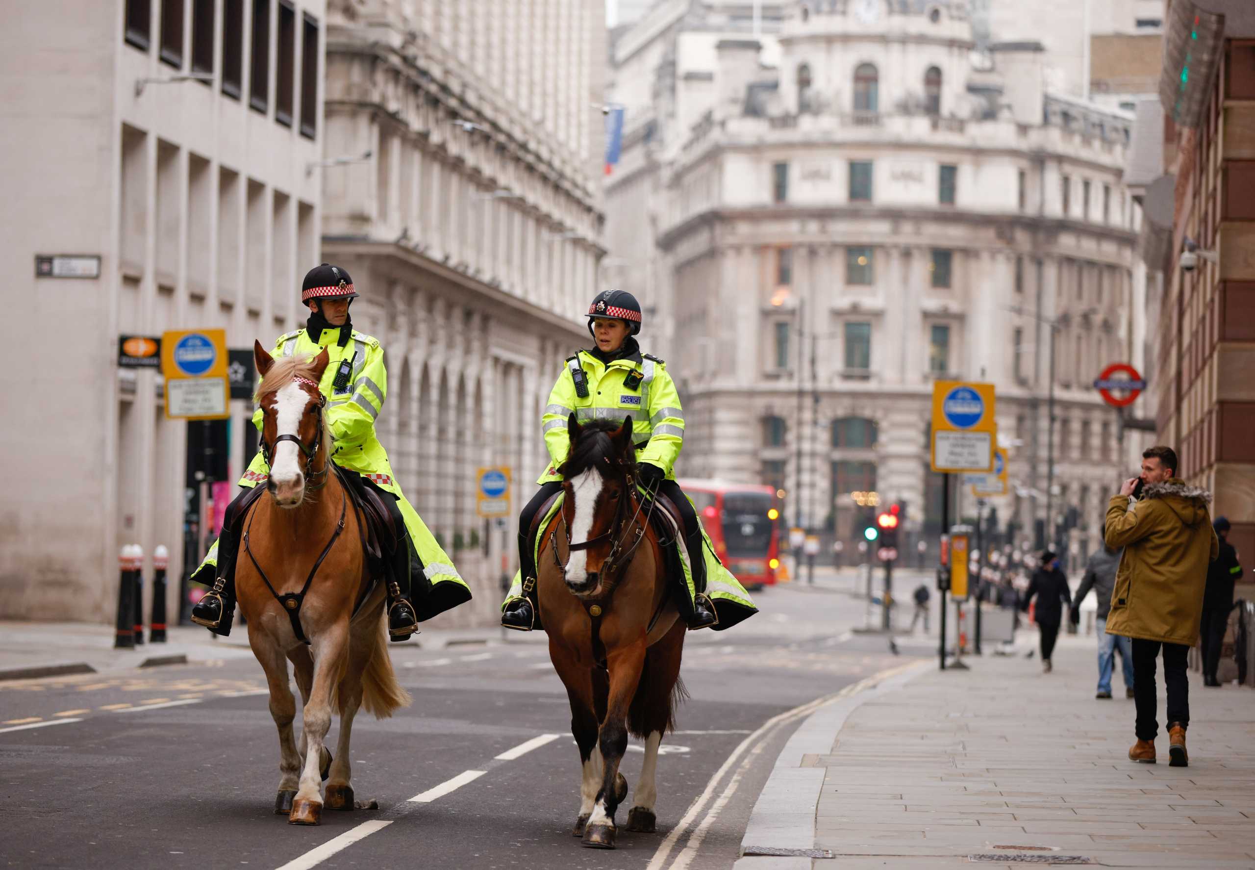 Police officers on horseback patrol the financial district, as the spread of the coronavirus disease (COVID-19) continues, in London, Britain, January 8, 2021. REUTERS