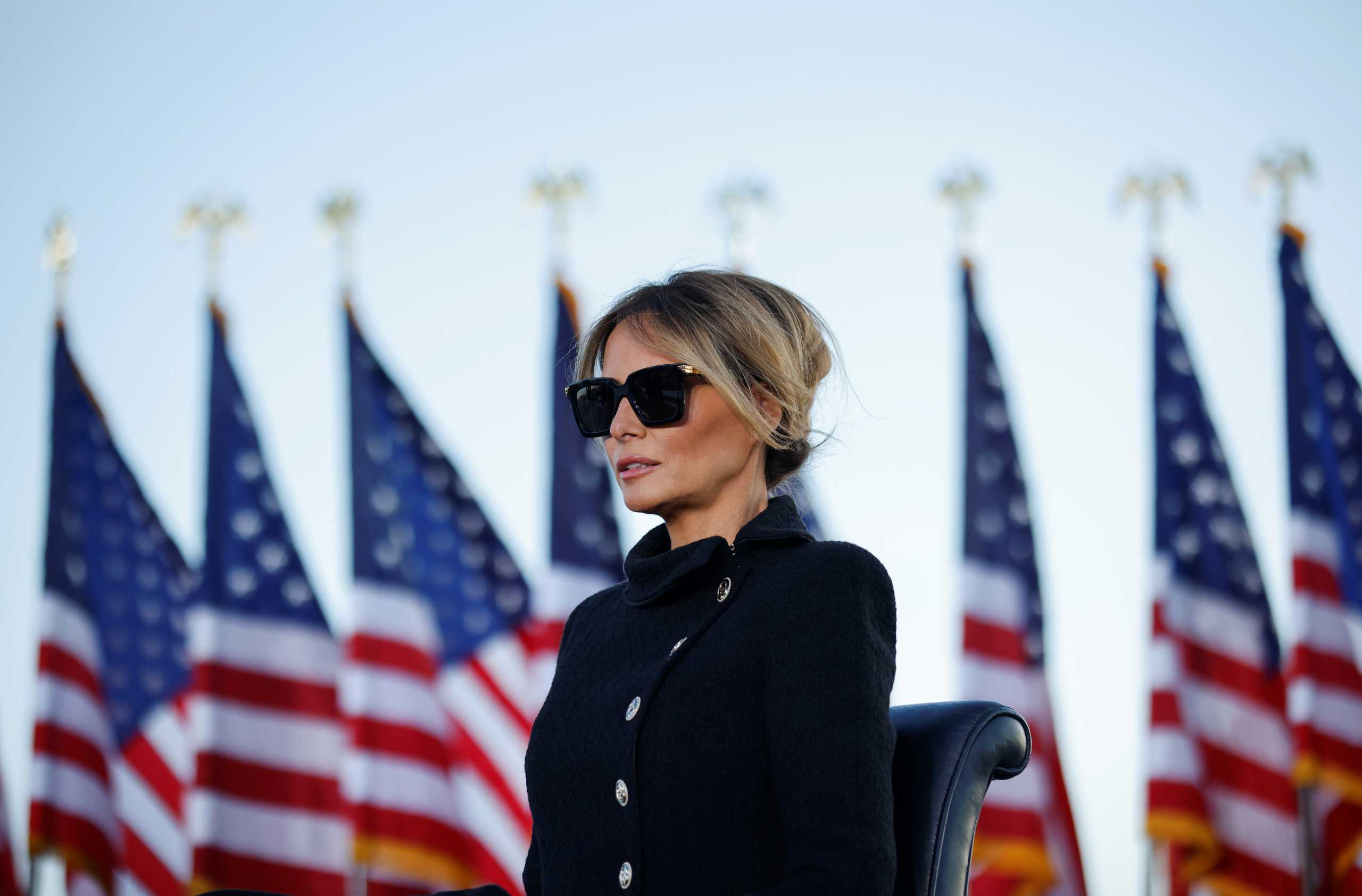 First lady Melania Trump watches as U.S. President Donald Trump speaks at the Joint Base Andrews, Maryland, U.S., January 20, 2021. REUTERS