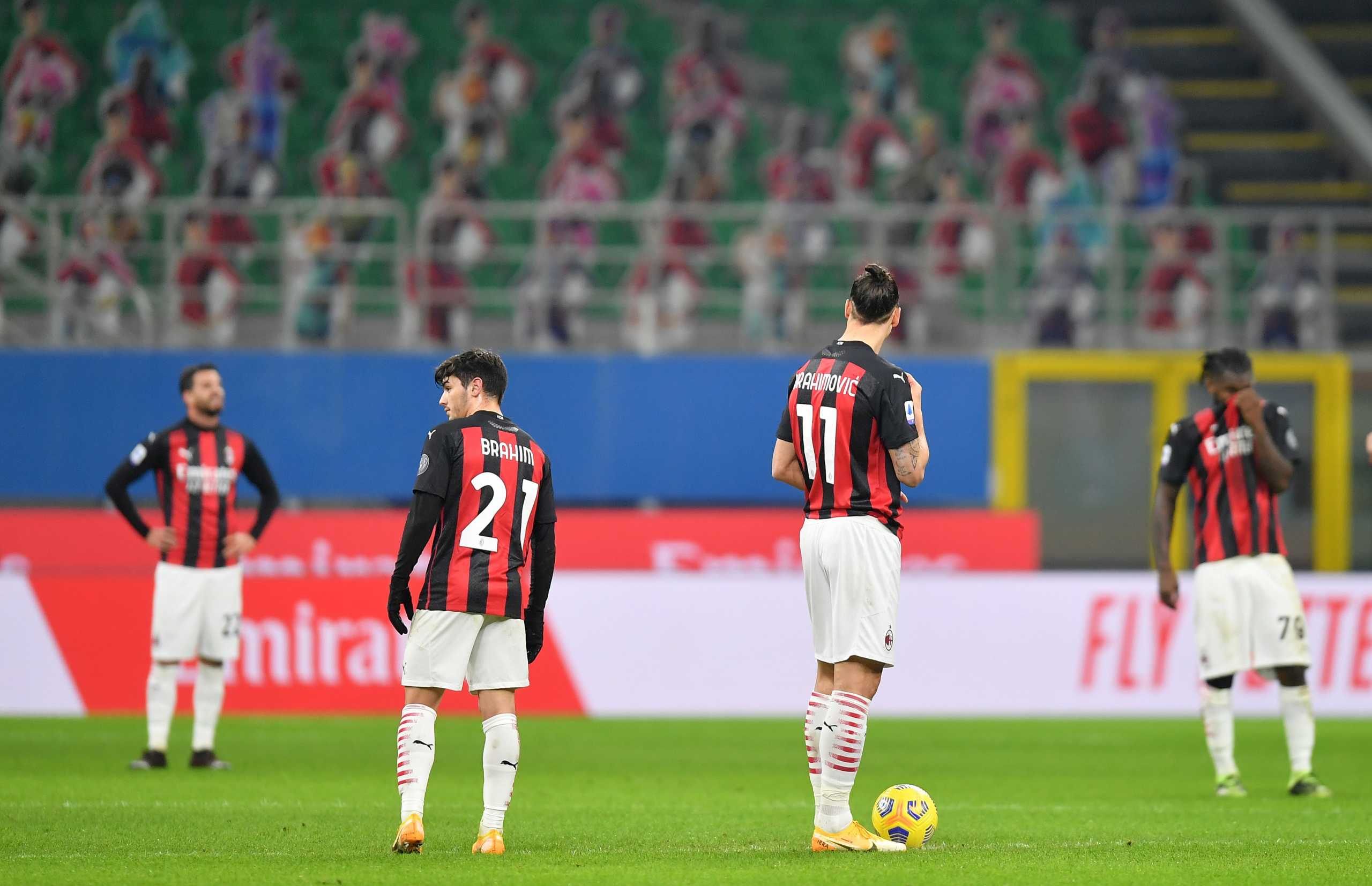 Soccer Football - Serie A - AC Milan v Atalanta - San Siro, Milan, Italy - January 23, 2021 AC Milan's Zlatan Ibrahimovic with teammates after Atalanta's third goal REUTERS