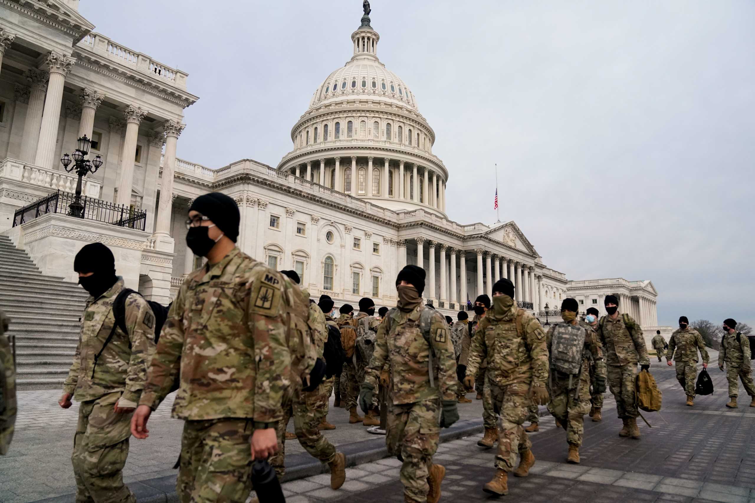 Members of the National Guard arrive to the U.S. Capitol days after supporters of U.S. President Donald Trump stormed the Capitol in Washington, U.S. January 11, 2021. REUTERS