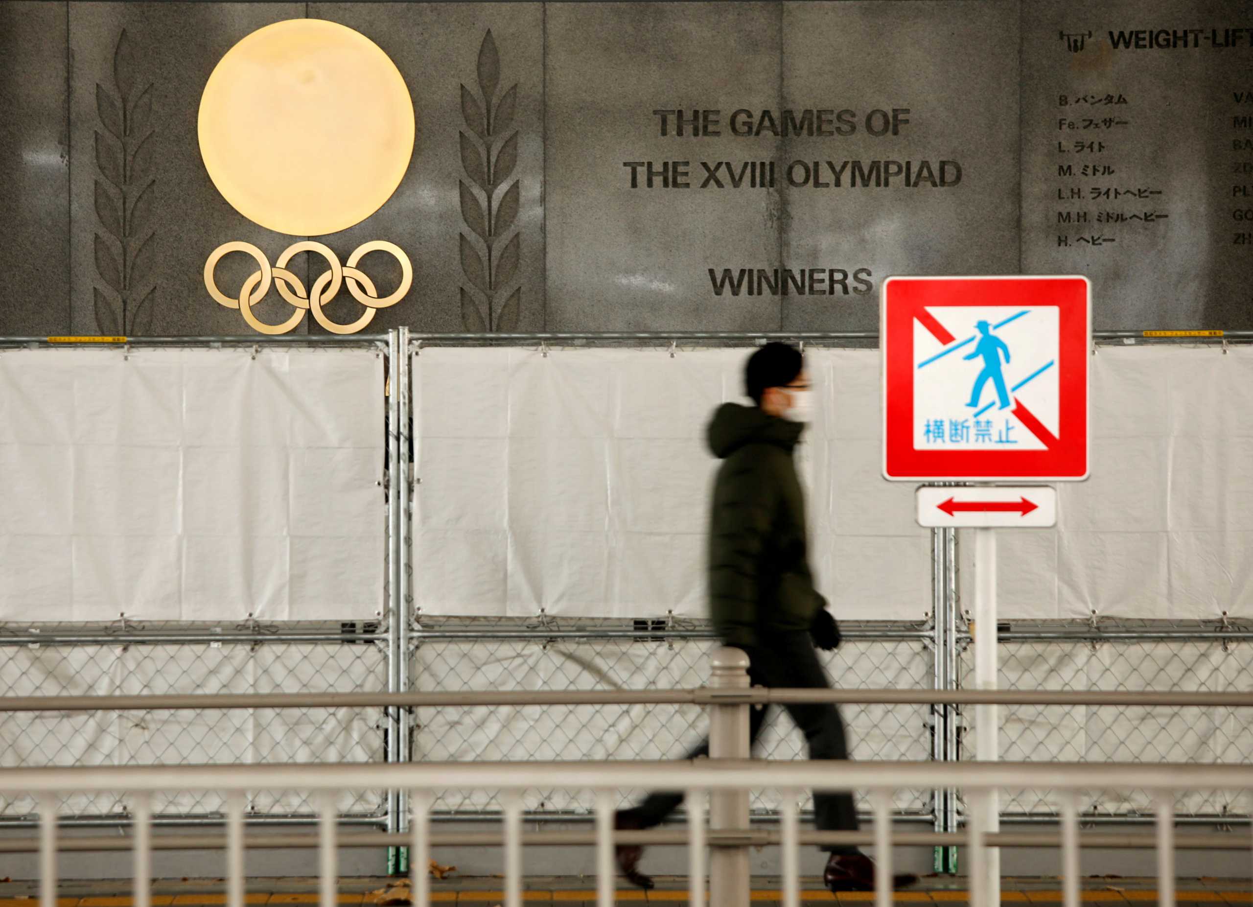FILE PHOTO: Olympic rings are seen outside the National Stadium, the main venue for the 2020 Olympic and Paralympic Games in Tokyo, Japan January 8, 2021.  REUTERS