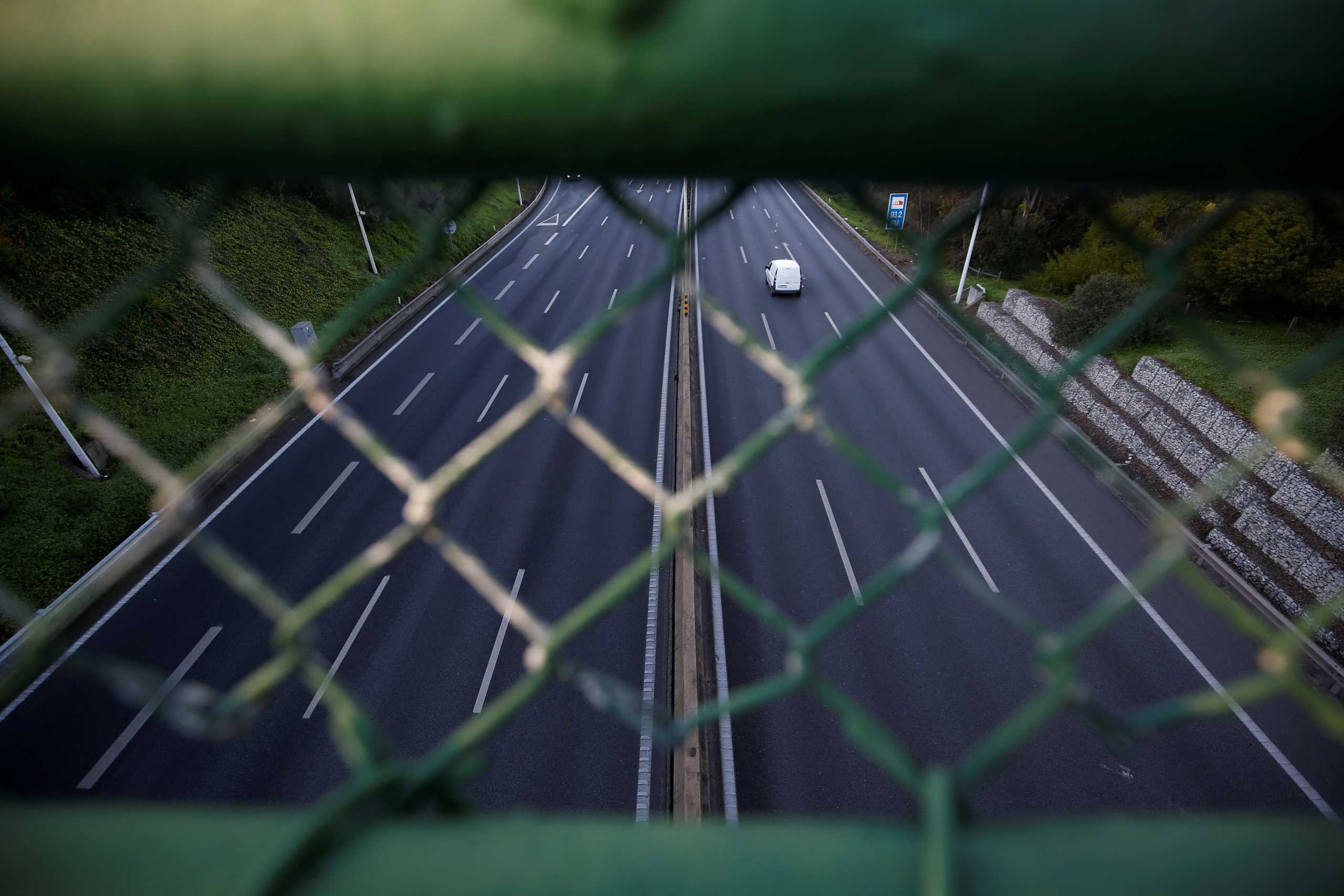 A car is seen on a highway leading to Lisbon on the first day of the second national lockdown due to the coronavirus disease (COVID-19) pandemic in Lisbon, Portugal, January 15, 2021. REUTERS