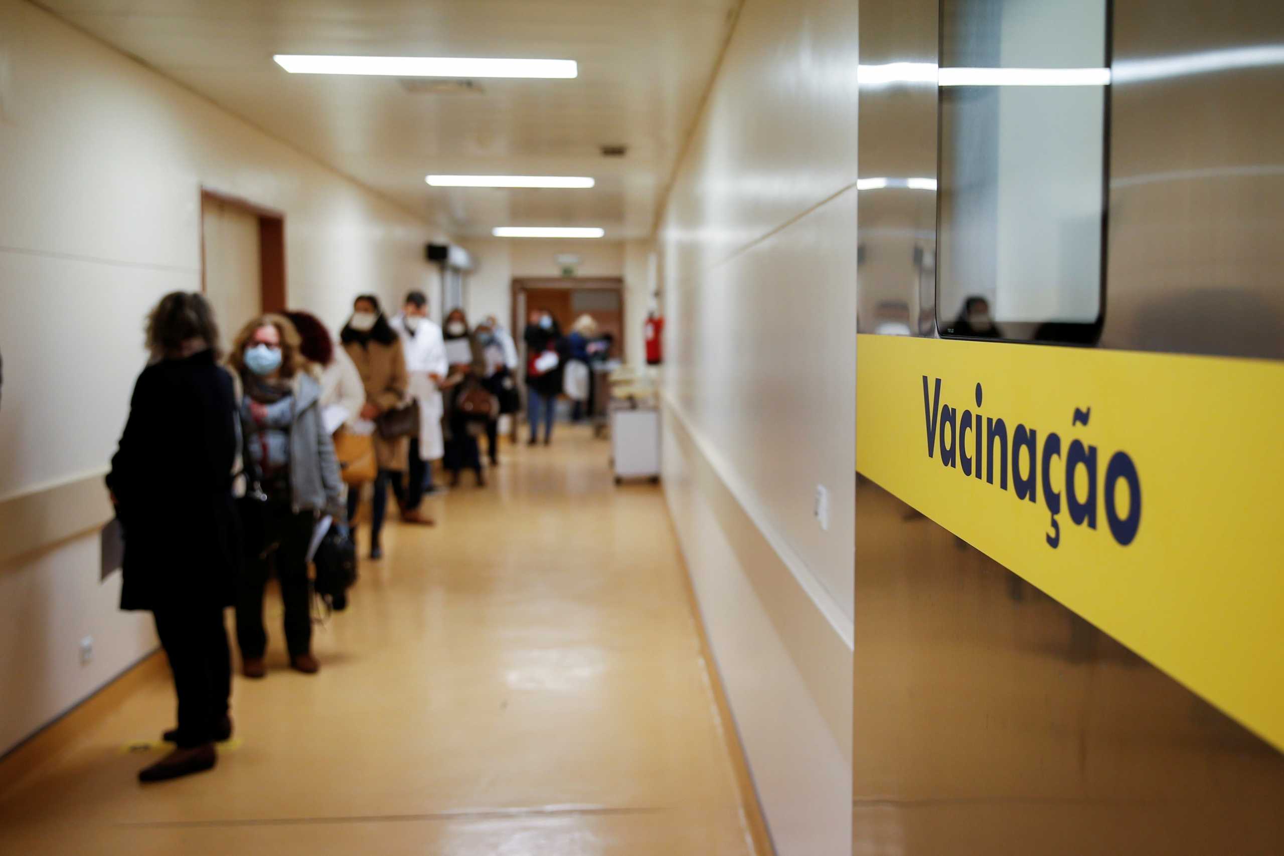 Medical workers wait in line to receive the Pfizer-BioNTech coronavirus disease (COVID-19) vaccine at Sao Jose Hospital in Lisbon, Portugal January 19, 2021. REUTERS