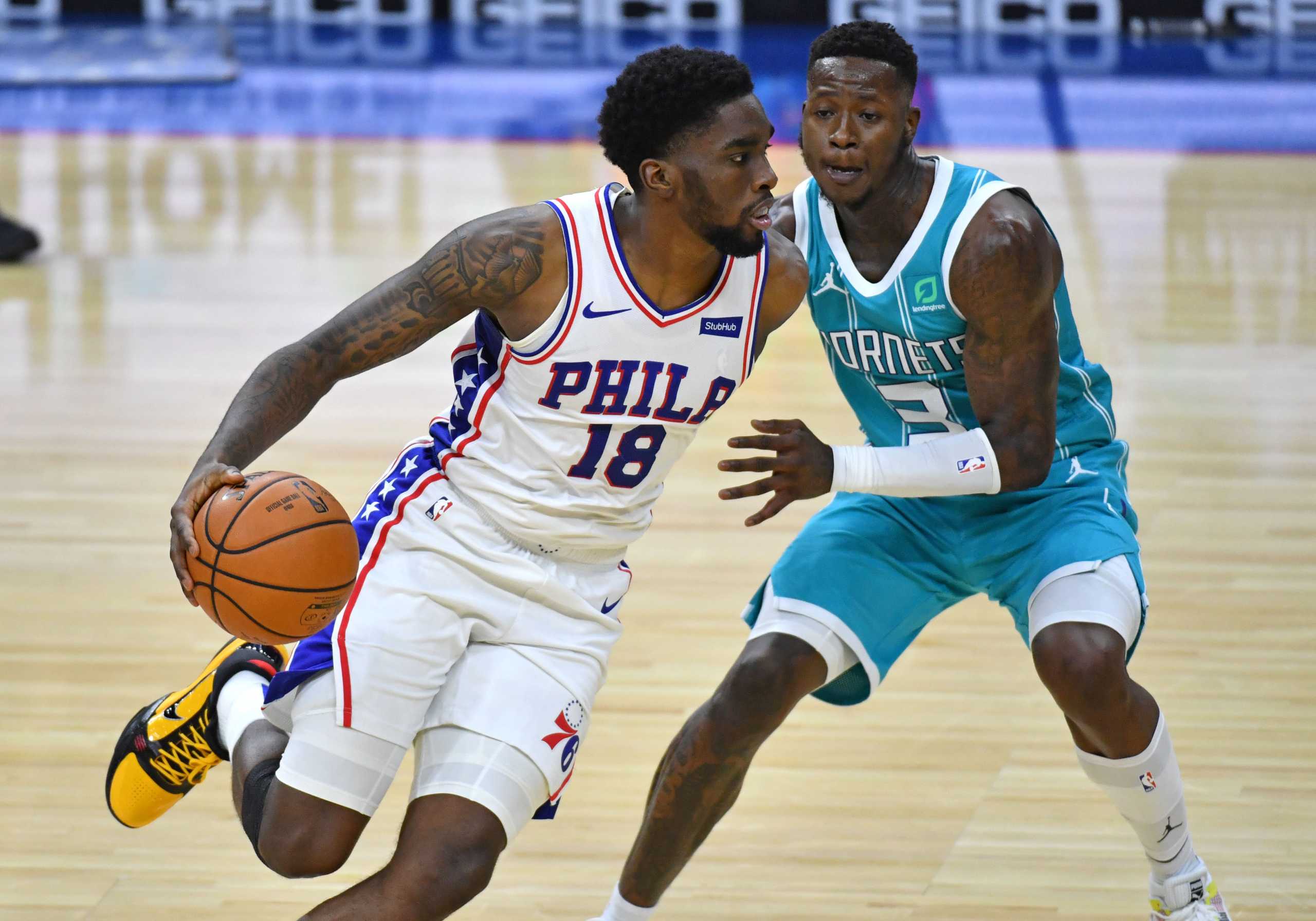 Jan 2, 2021; Philadelphia, Pennsylvania, USA; Philadelphia 76ers guard Shake Milton (18) drives to the basket against Charlotte Hornets guard Terry Rozier (3) during the fourth quarter at Wells Fargo Center. Mandatory Credit: Eric Hartline-USA TODAY Sports