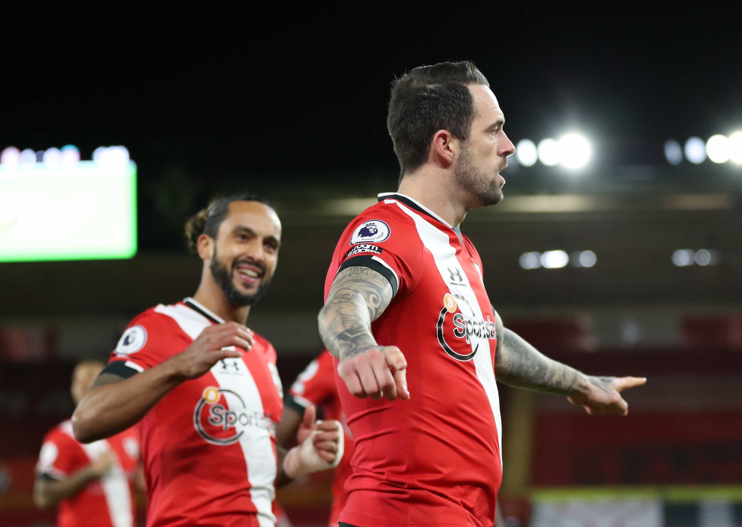 Soccer Football - Premier League - Southampton v Liverpool - St Mary's Stadium, Southampton, Britain - January 4, 2021 Southampton's Danny Ings celebrates scoring their first goal with teammates Pool via REUTERS