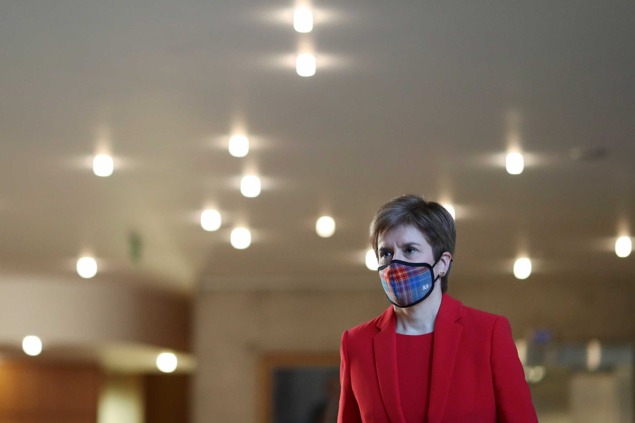 Scottish First Minister Nicola Sturgeon arrives at the parliament, as the spread of the coronavirus disease (COVID-19) continues, in Edinburgh, Scotland, Britain, December 22, 2020. REUTERS